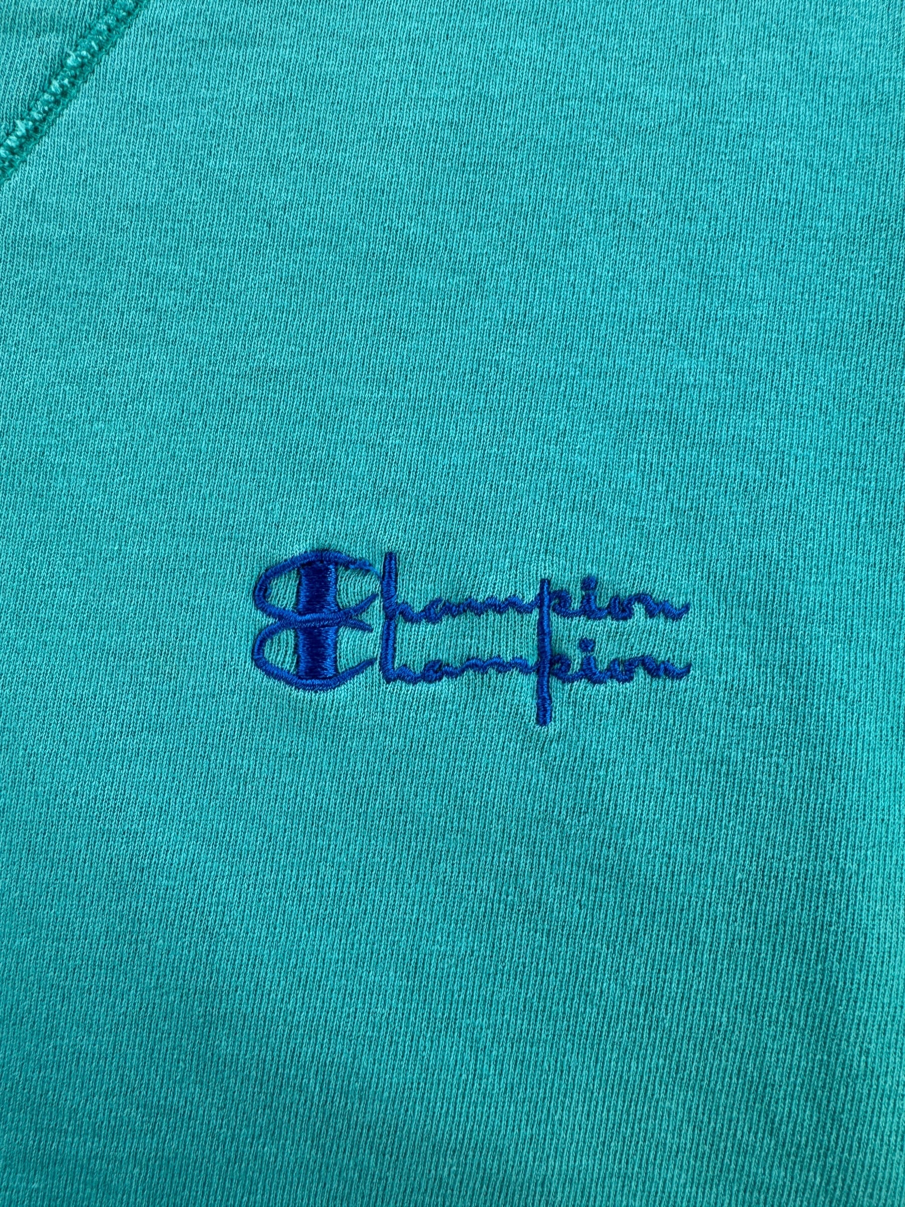 Label on Vintage Champion Reverse Weave Teal Crewneck SZ XL (Fits L)