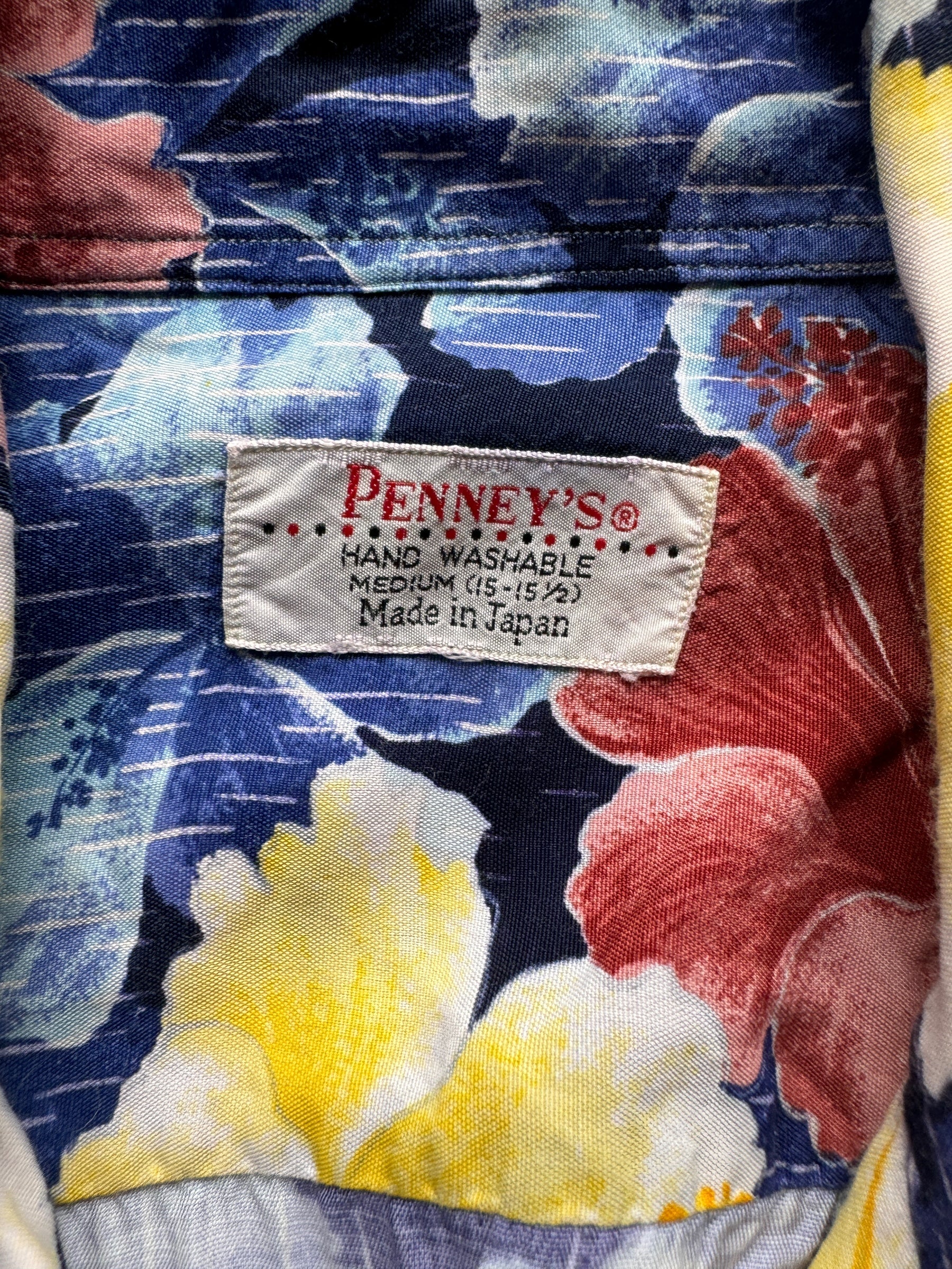 tag on Vintage Made in Japan Blue/Yellow/Mauve Floral Penney's Aloha Shirt SZ M