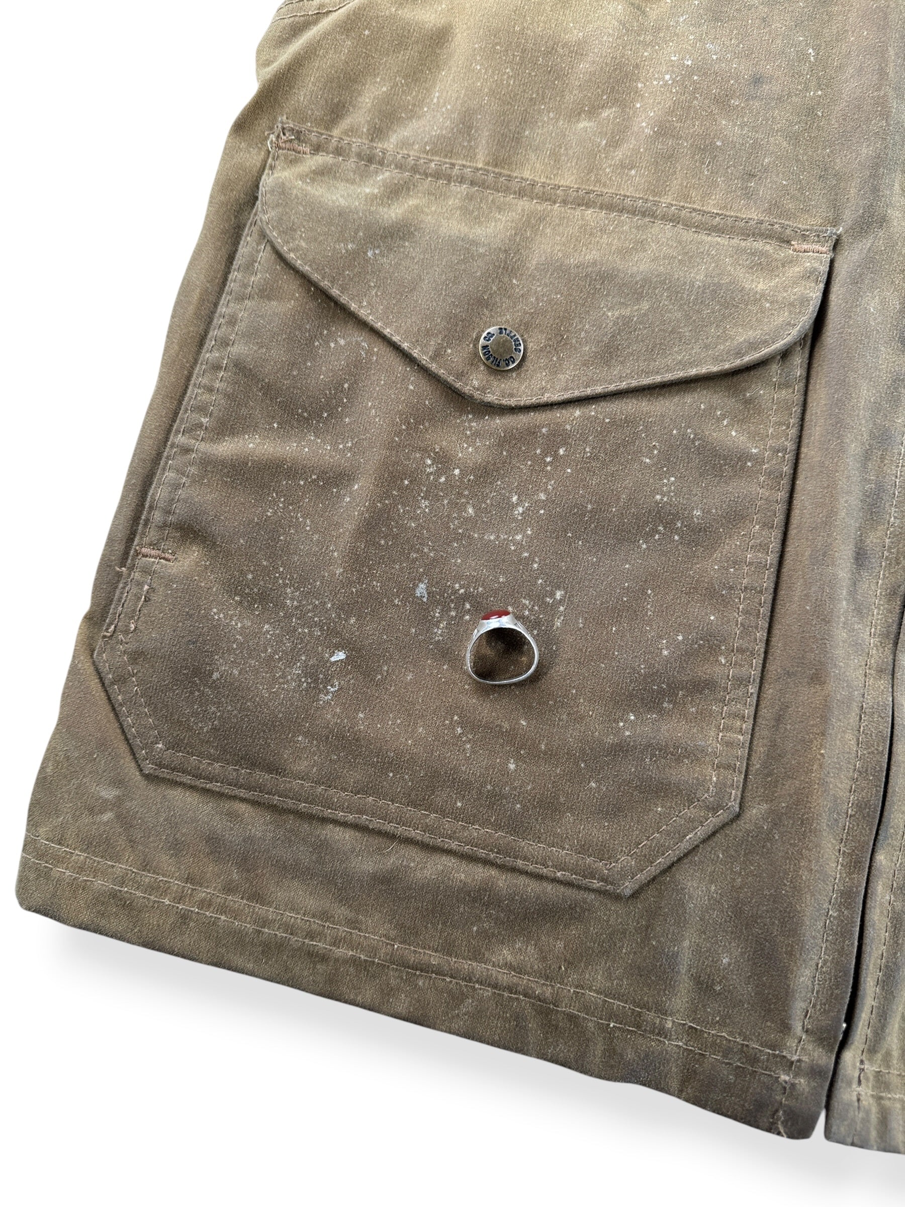 Speckled stains on pocket of Filson Tin Cloth Hunting Vest SZ M