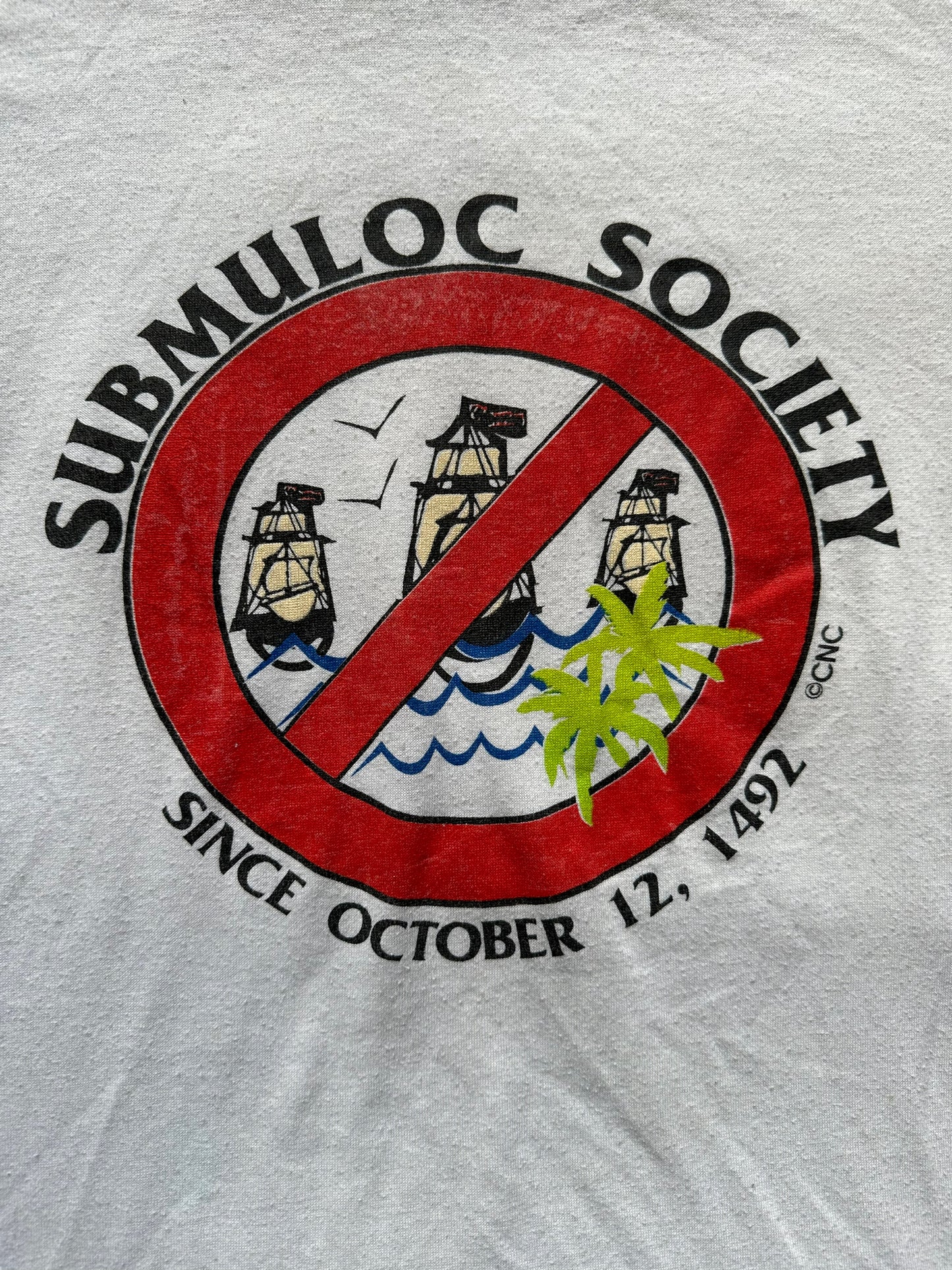 Graphic Detail on Vintage Submuloc First Nations Anti-Columbus Tee SZ M | Vintage Graphic T-Shirts Seattle | Barn Owl Vintage Tees Seattle