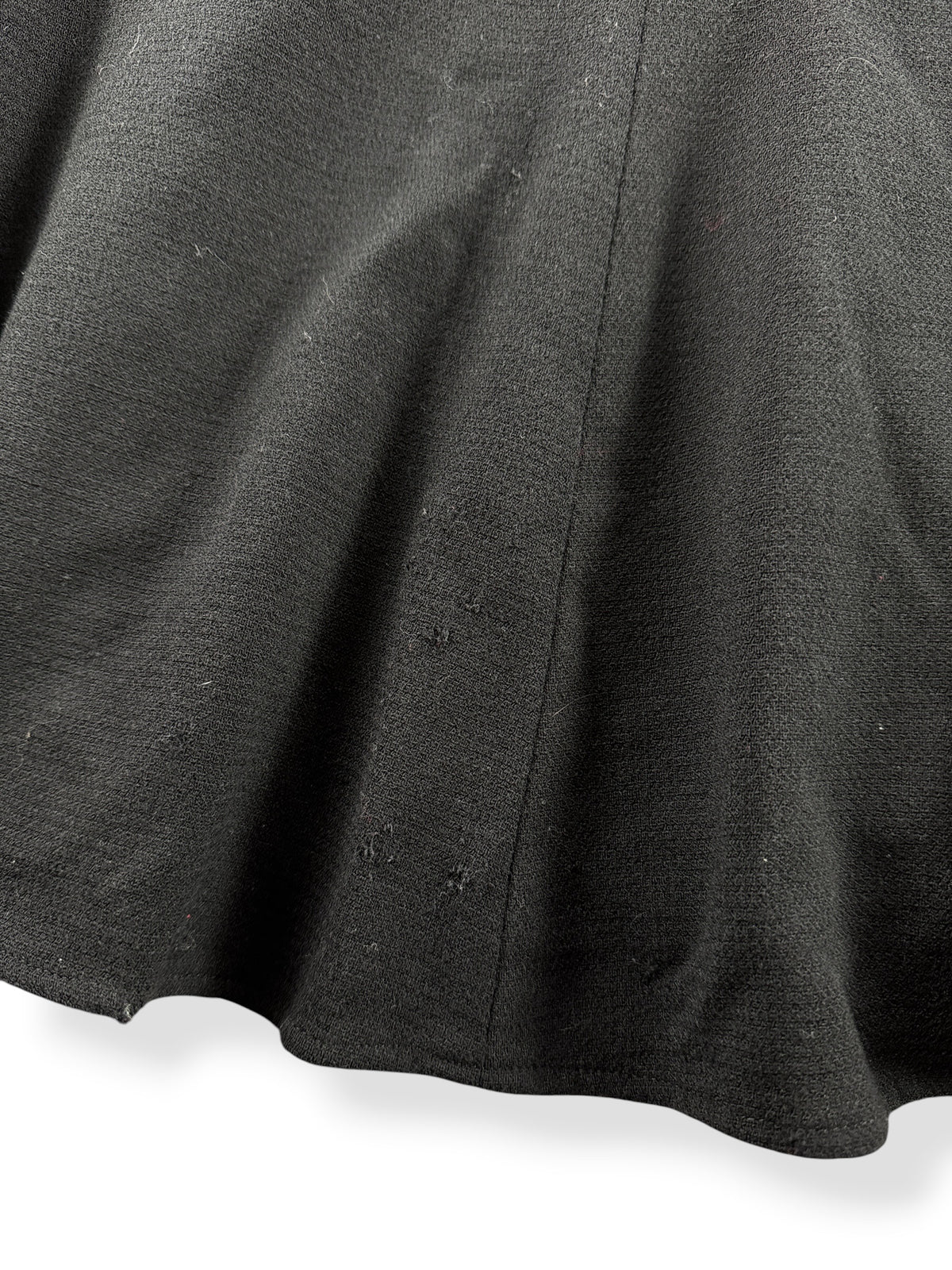 Pilling near bottom of Vintage Black Wool Fit and Flare Skirt W28