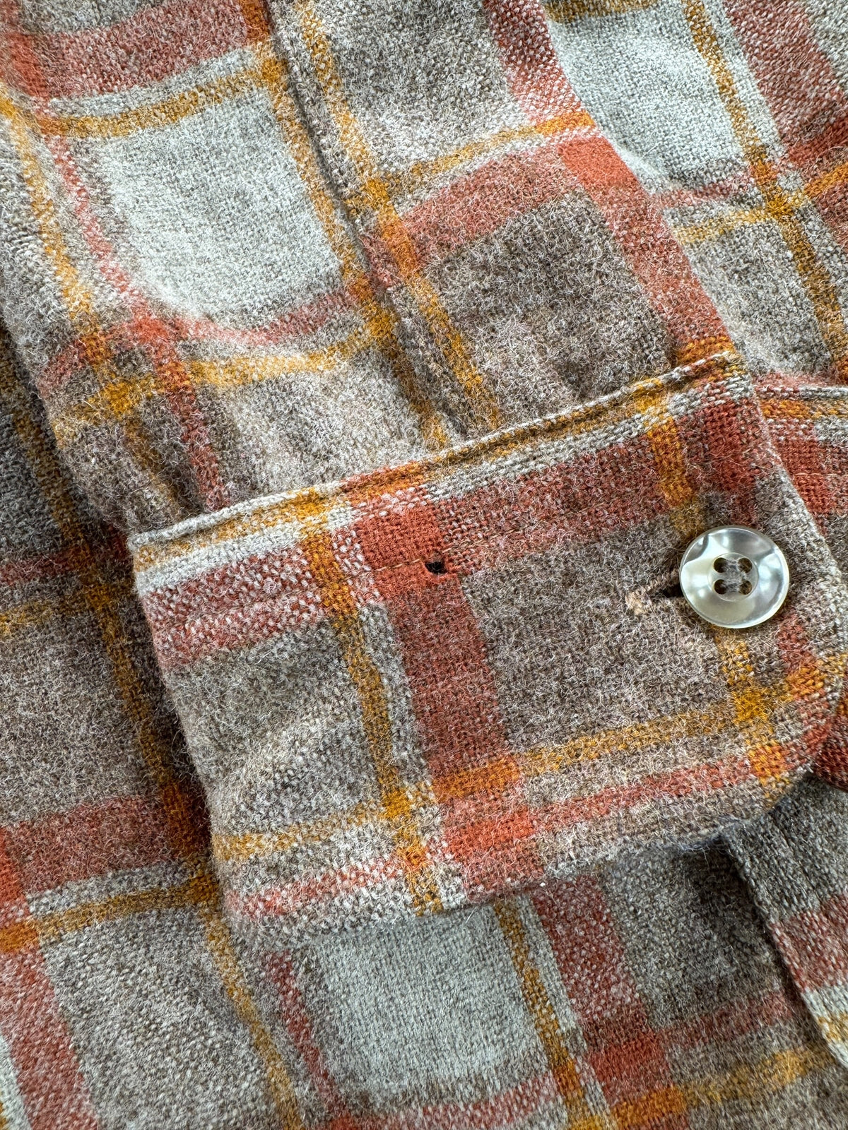 Hole on cuff of Vintage Pendleton Orange & Beige Board Shirt SZ L - AS IS