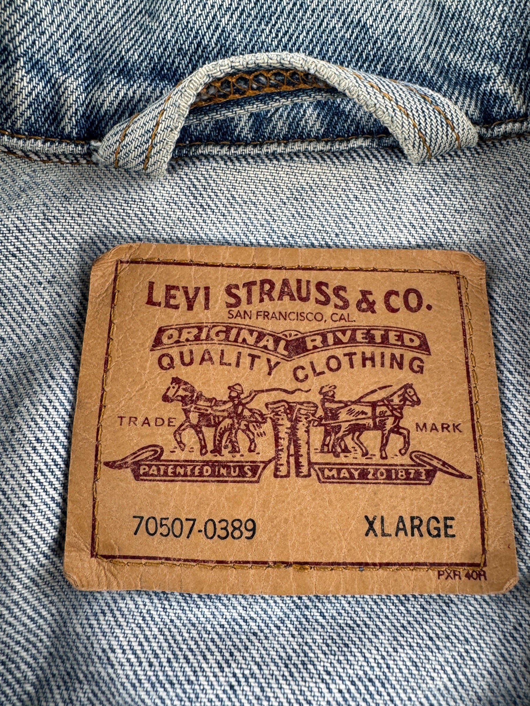 Tag on Vintage 90s Levi's Denim Trucker Jacket SZ XL