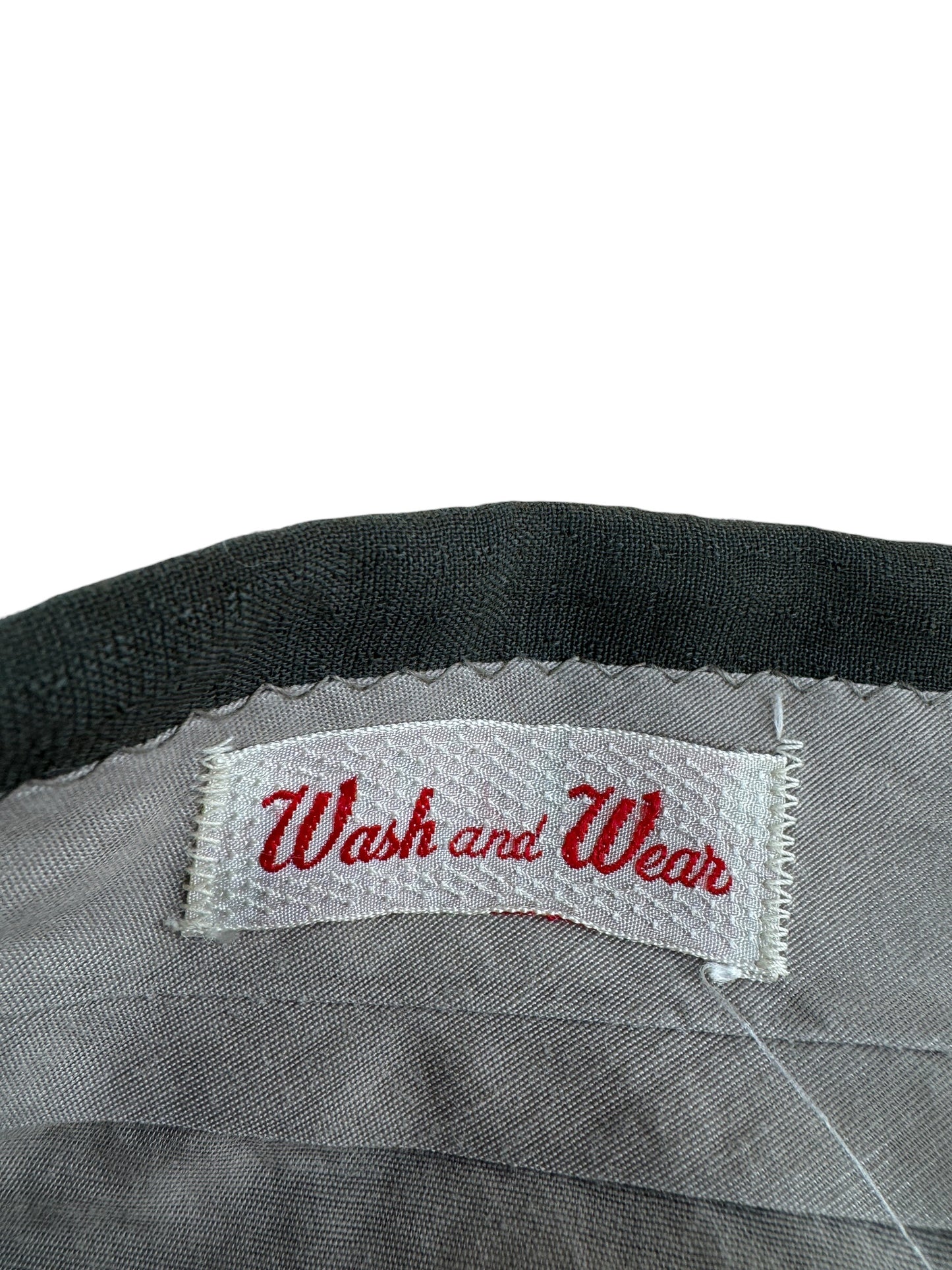 Label on Vintage Olive Green Drop Loop Trousers W34