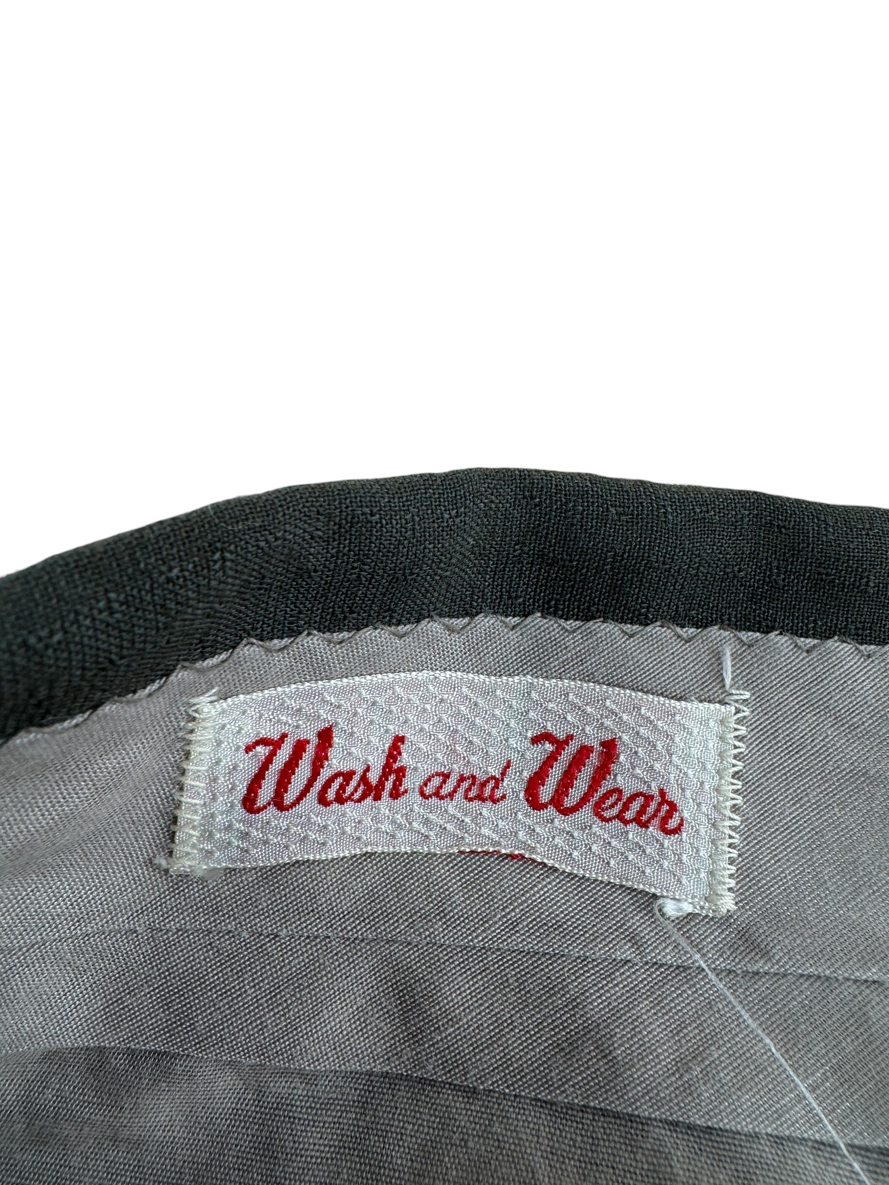 Label on Vintage Olive Green Drop Loop Trousers W34