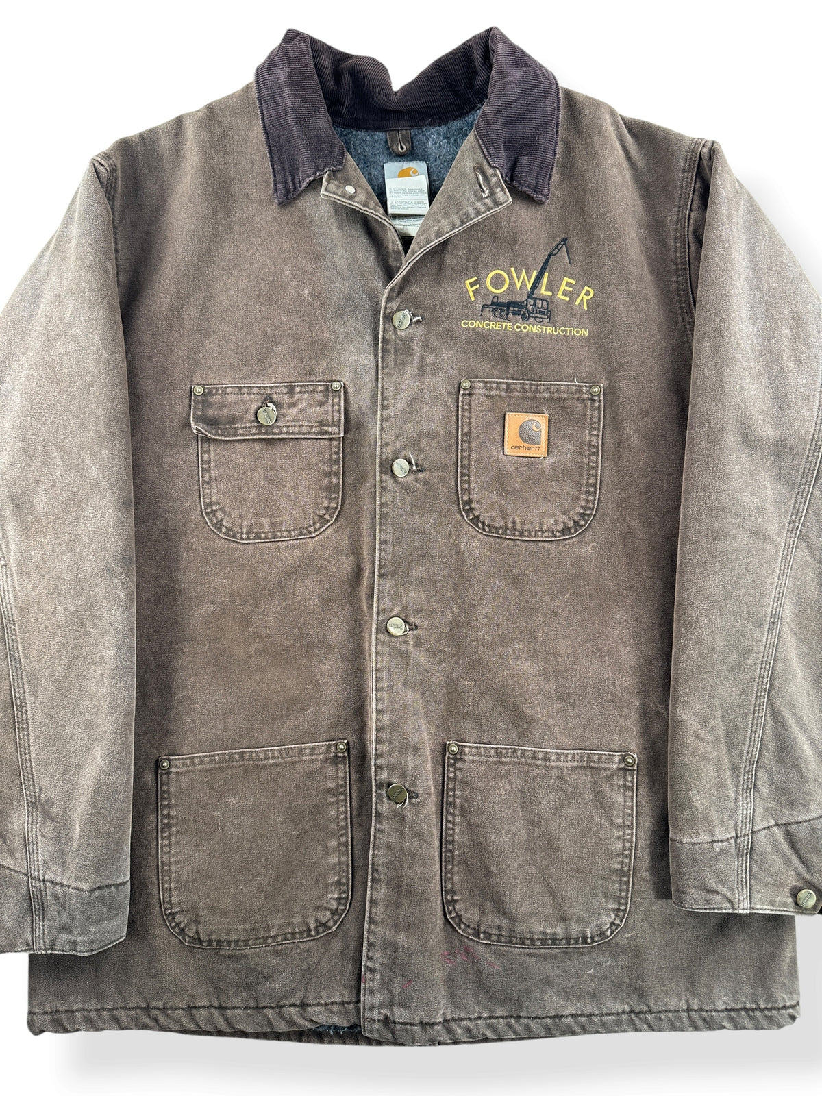 Close-up of Vintage Brown Carhartt Chore Jacket SZ XL