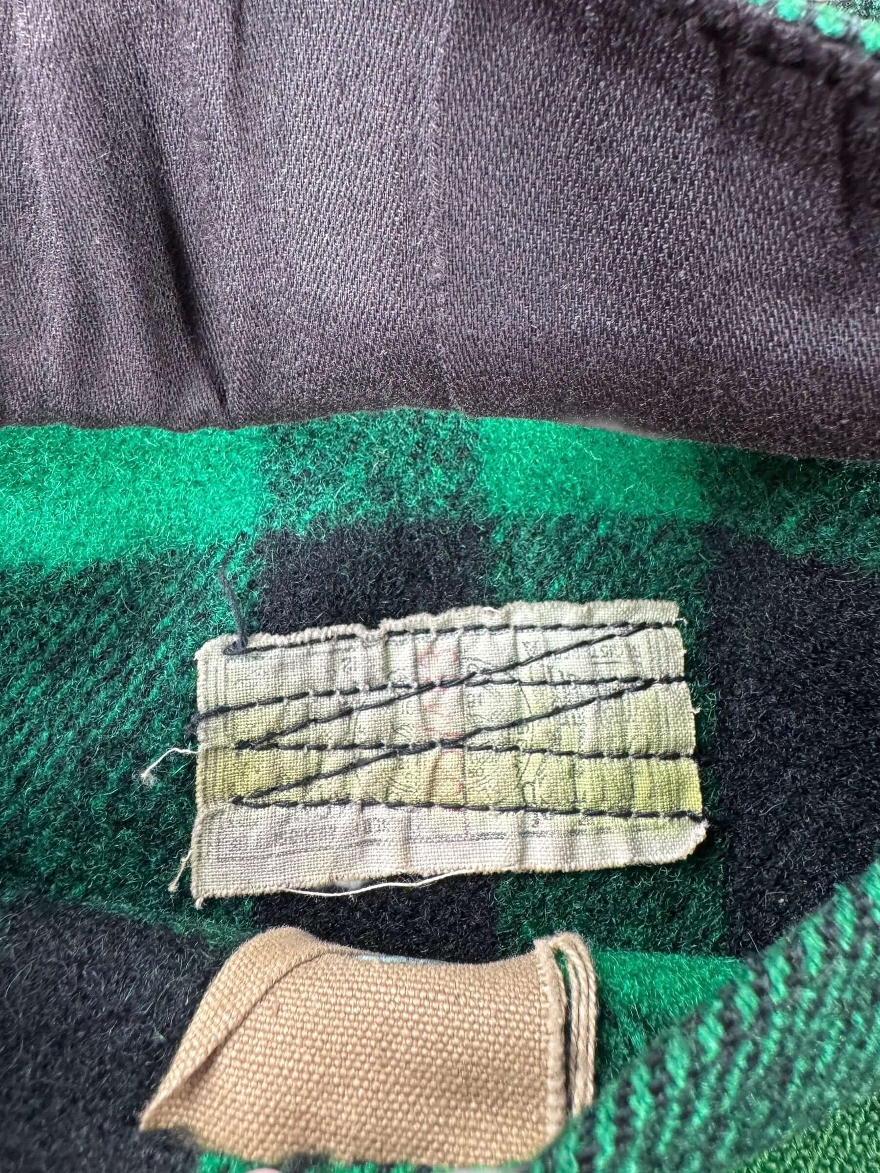 Union Tag on Vintage Union Made Filson Green and Black Cruiser Jacket SZ 46