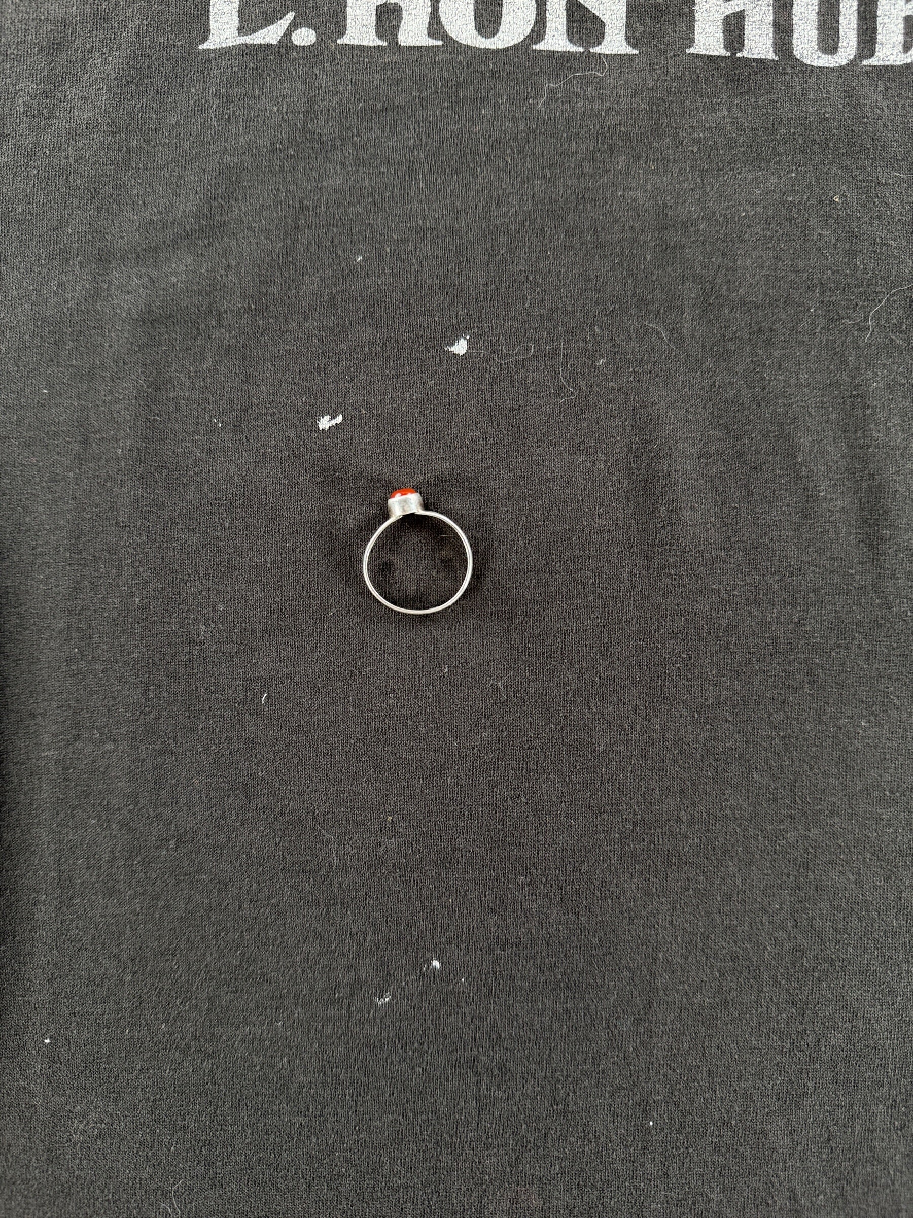 Small paint splatters on front of Vintage 80's L. Ron Hubbard Novel Tee SZ S