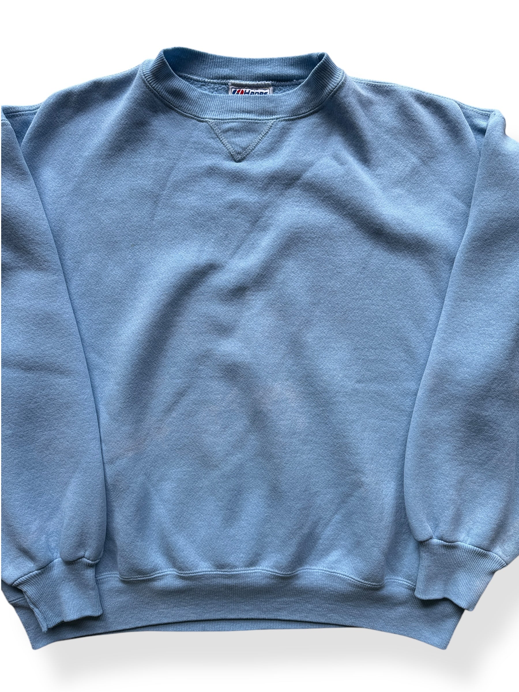 Front Close Up of Vintage Hanes Powder Blue Crewneck SZ XL