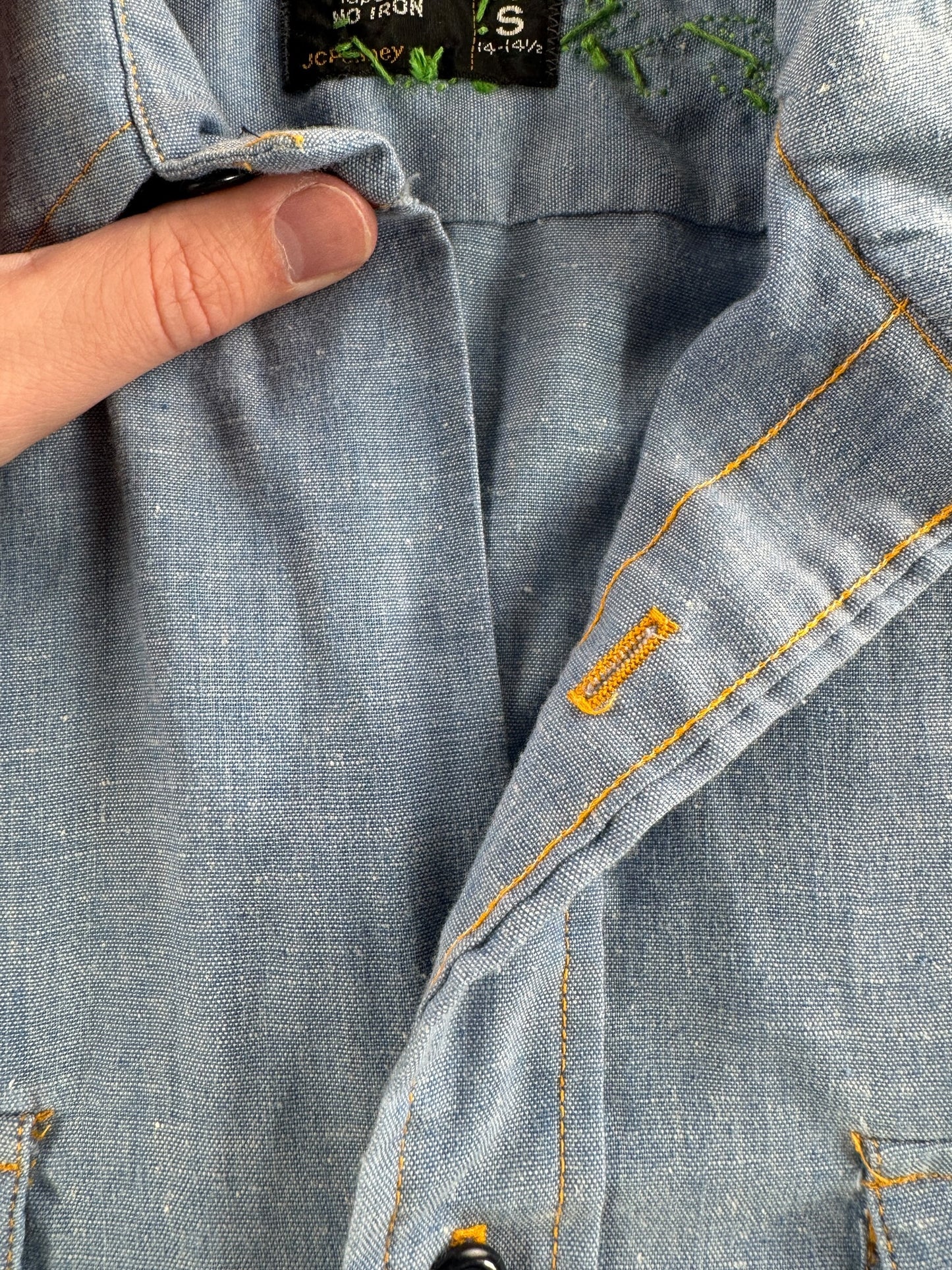 Close up of missing button at top front of Vintage 70s Embroidered Chambray Shirt