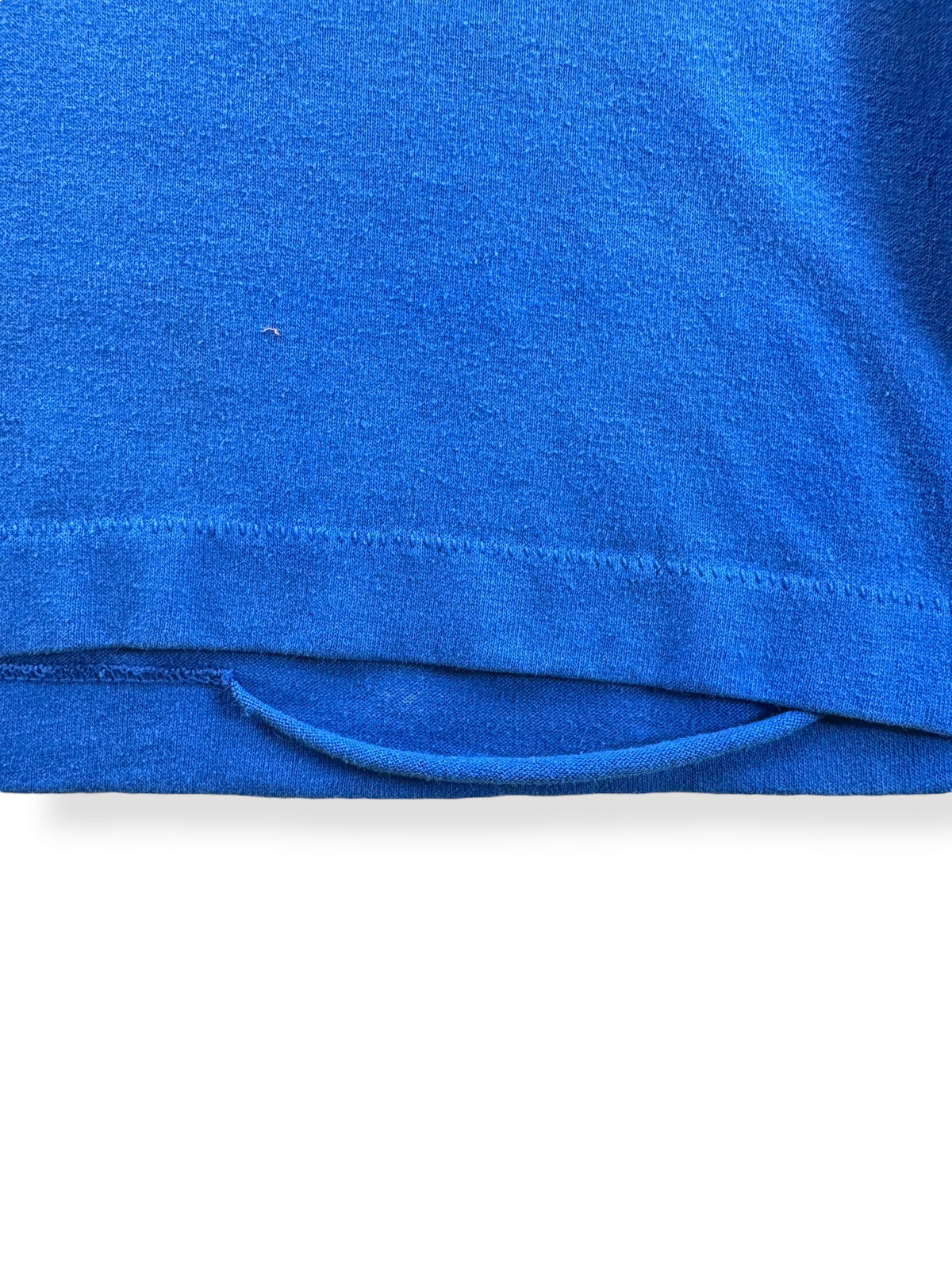 Stitch separation on bottom hem of Vintage Yakima Parks & Rec Deep Freeze Tee SZ L (Fits M)