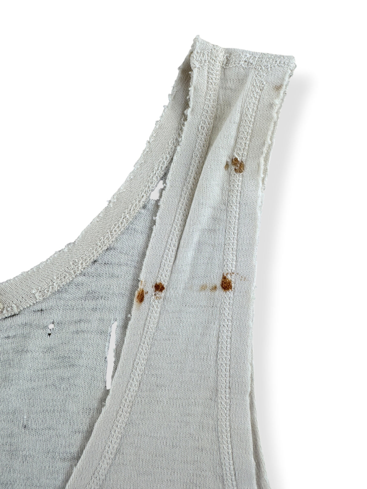 Staining on shoulder strap on Vintage 40s Distressed Rowing Tank Top SZ M