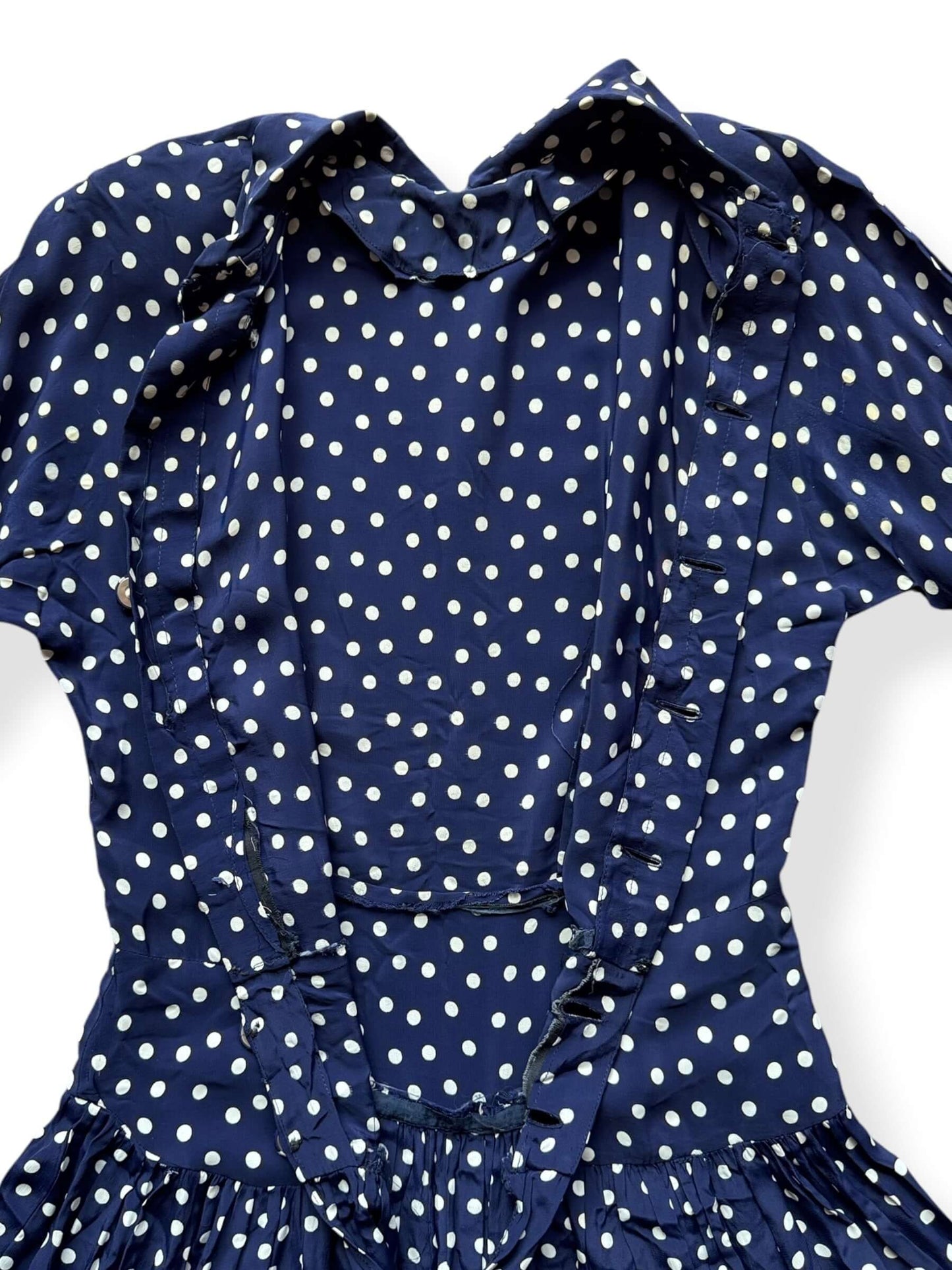 Open buttons on back of Vintage 1940s Rayon Drop Waist Polka Dot Dress