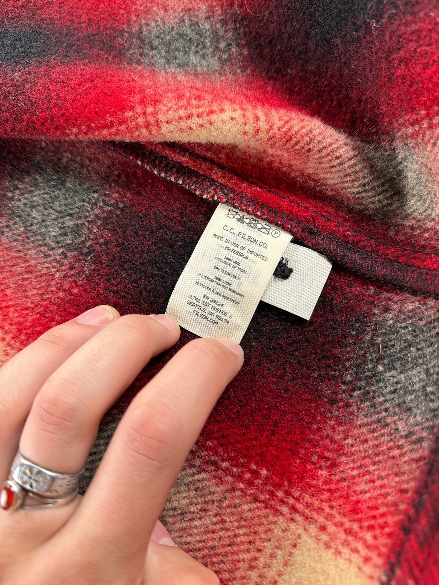 Care tag on Filson Plaid Jac Shirt SZ S