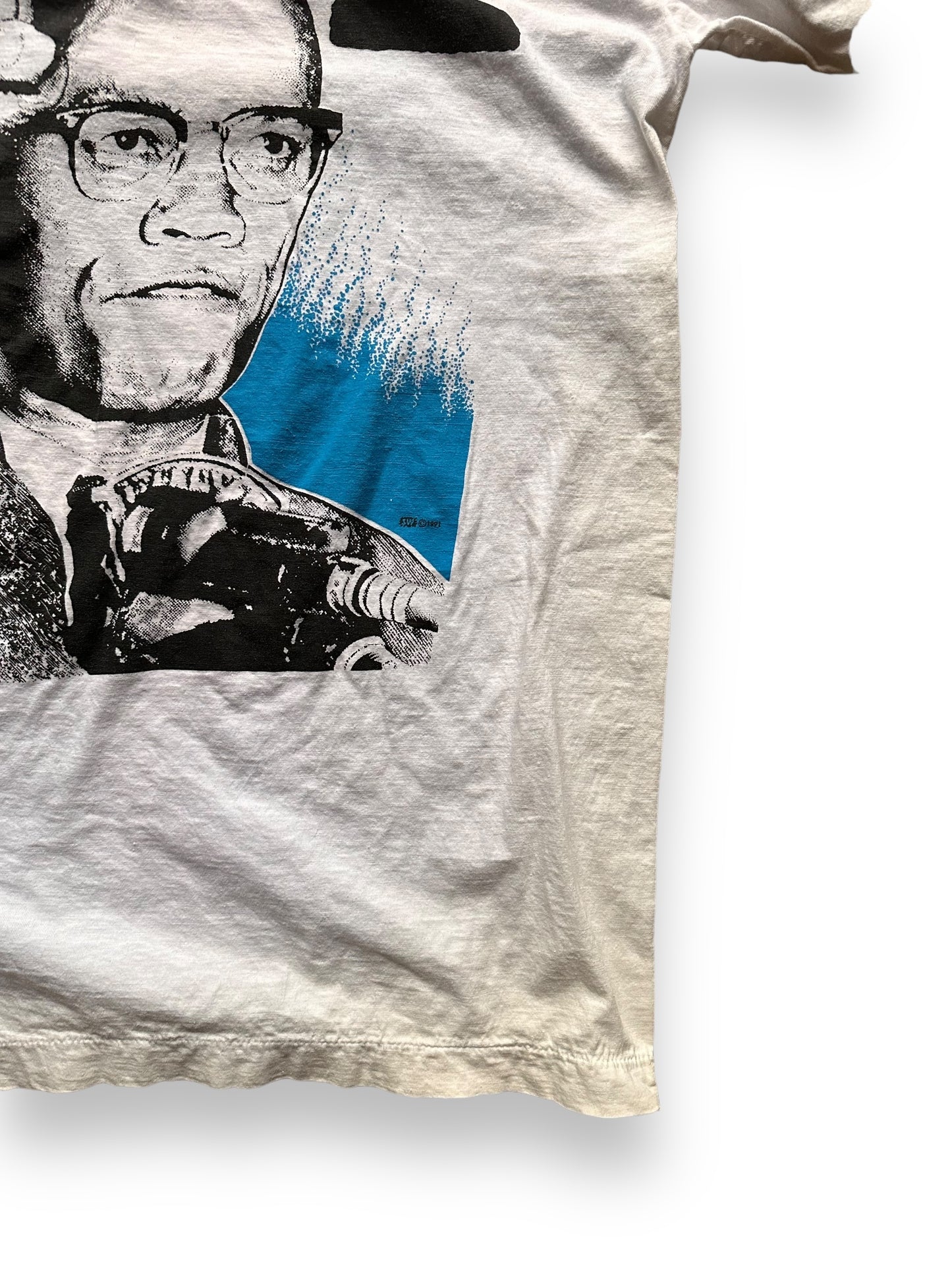 Lower Right Front View of Vintage 1991 Malcolm X Single Stitch Tee SZ M | Vintage Malcolm X T-Shirts Seattle | Barn Owl Vintage Clothing Seattle