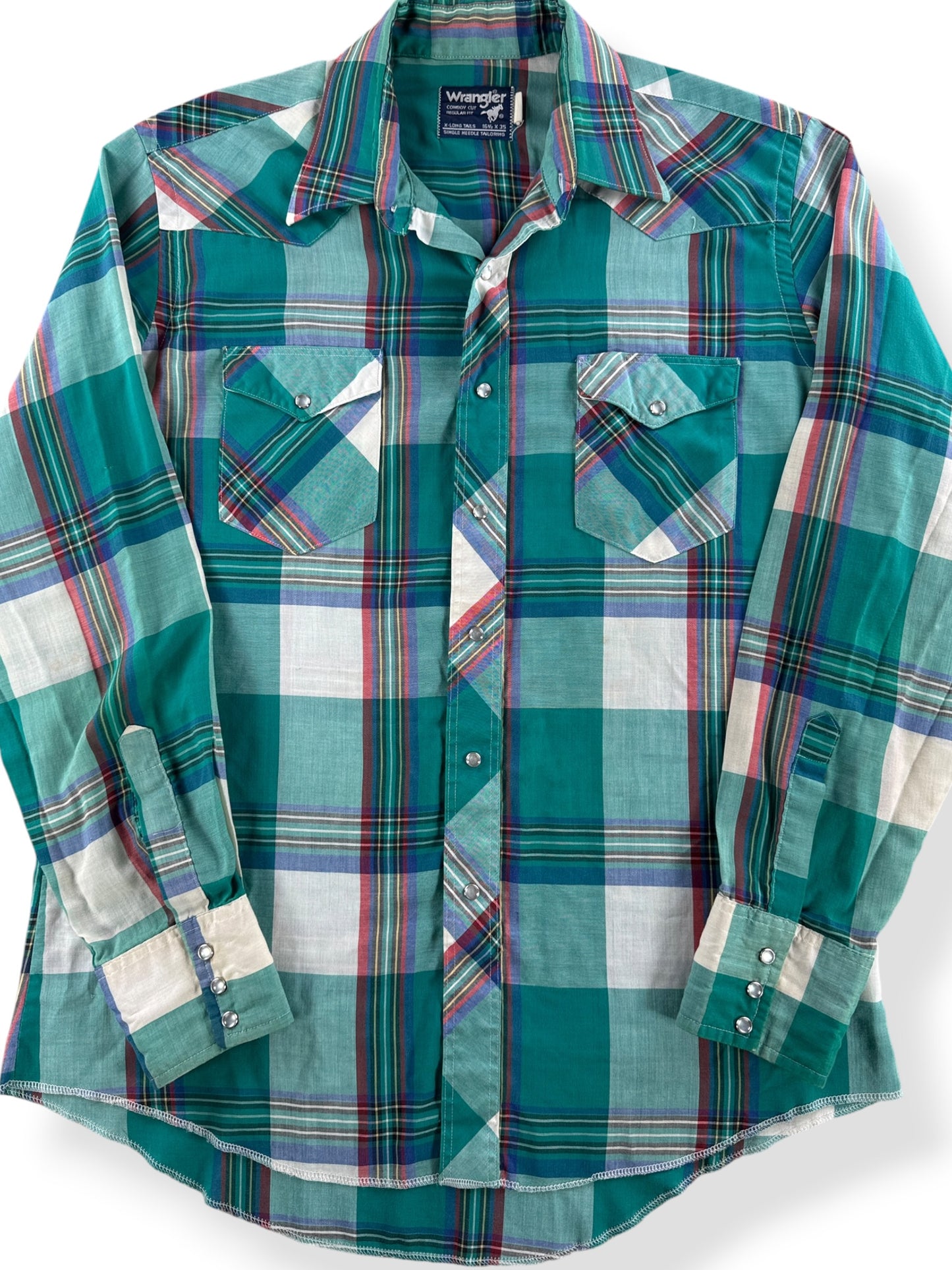 Close-up of Vintage Wrangler Green Plaid Pearlsnap SZ 16 1/2