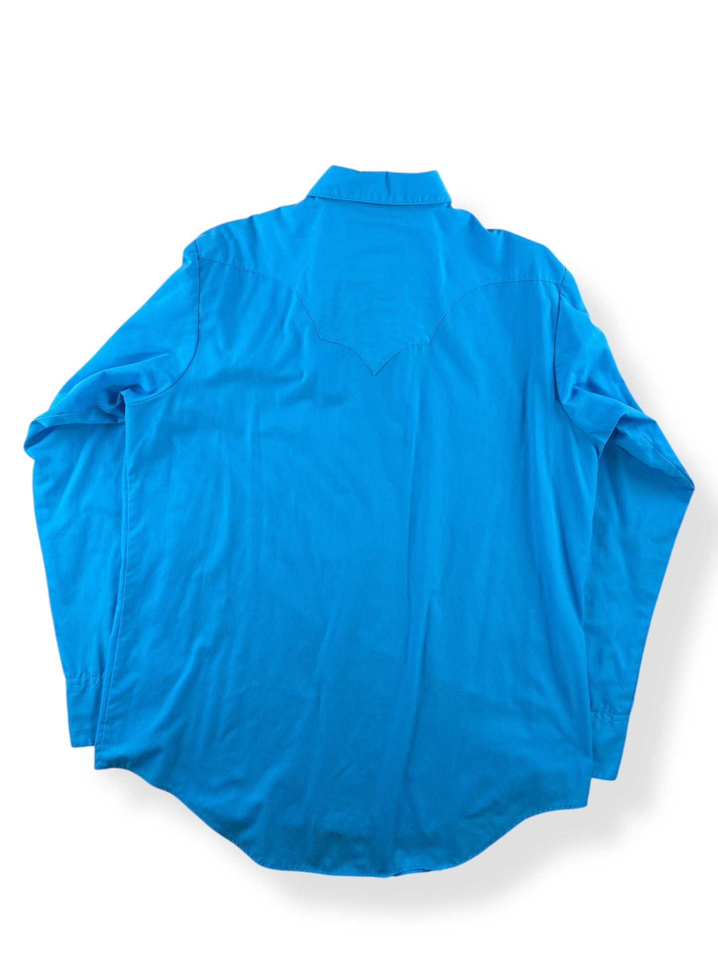 Back of Vintage Rockmount Electric Blue Pearl Snap SZ L