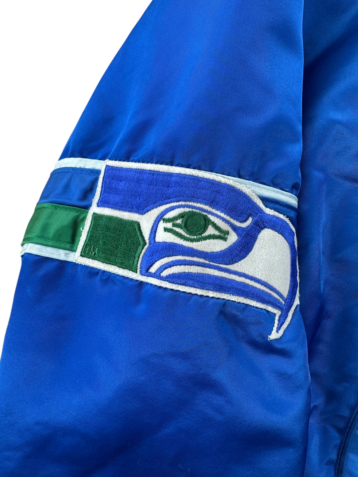 Seahawks logo on sleeve of Vintage Seattle Seahawks Starter Jacket SZ XL