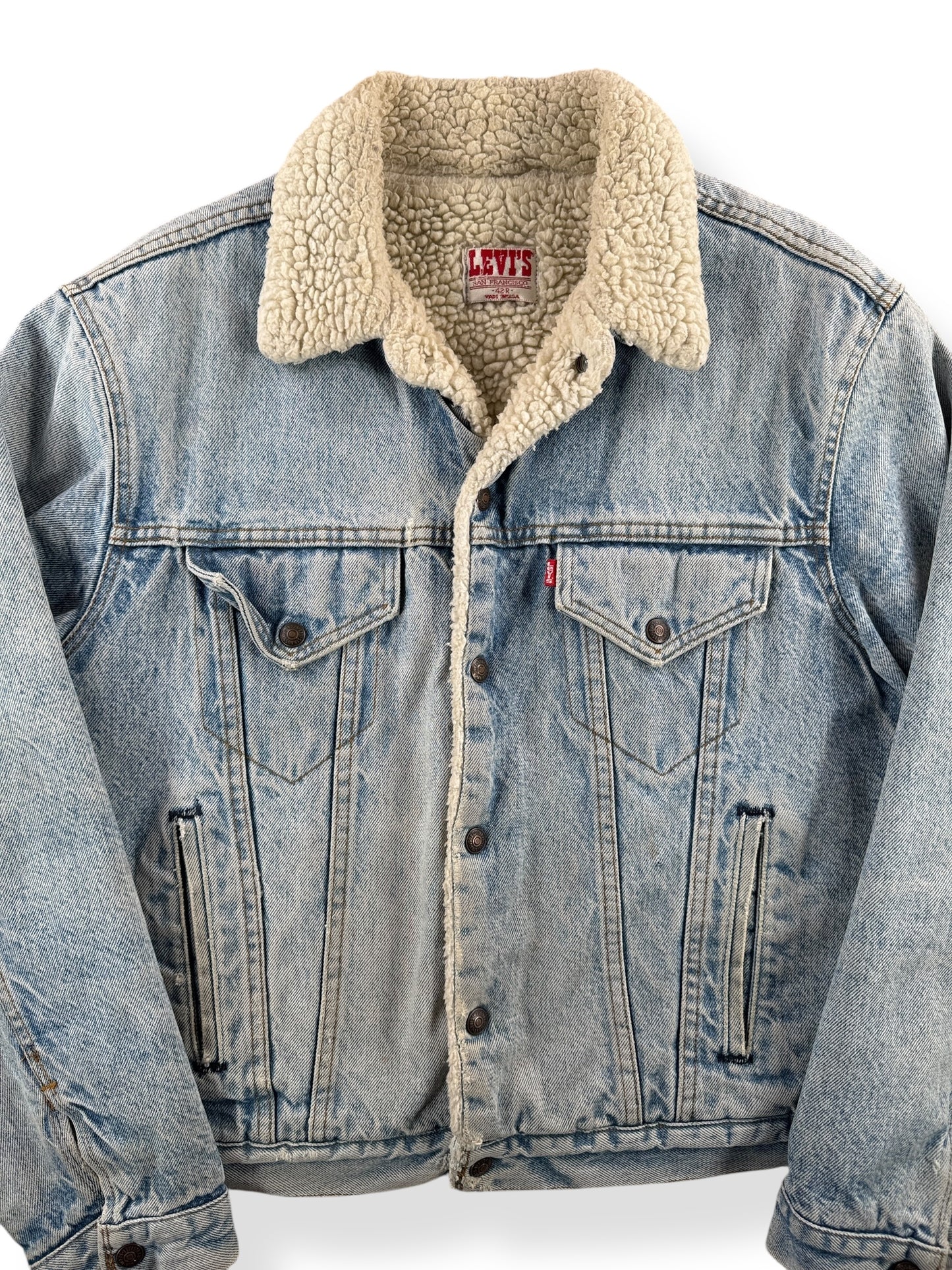 Front of Vintage Light Wash Levis Shearling Denim Trucker Jacket SZ 42