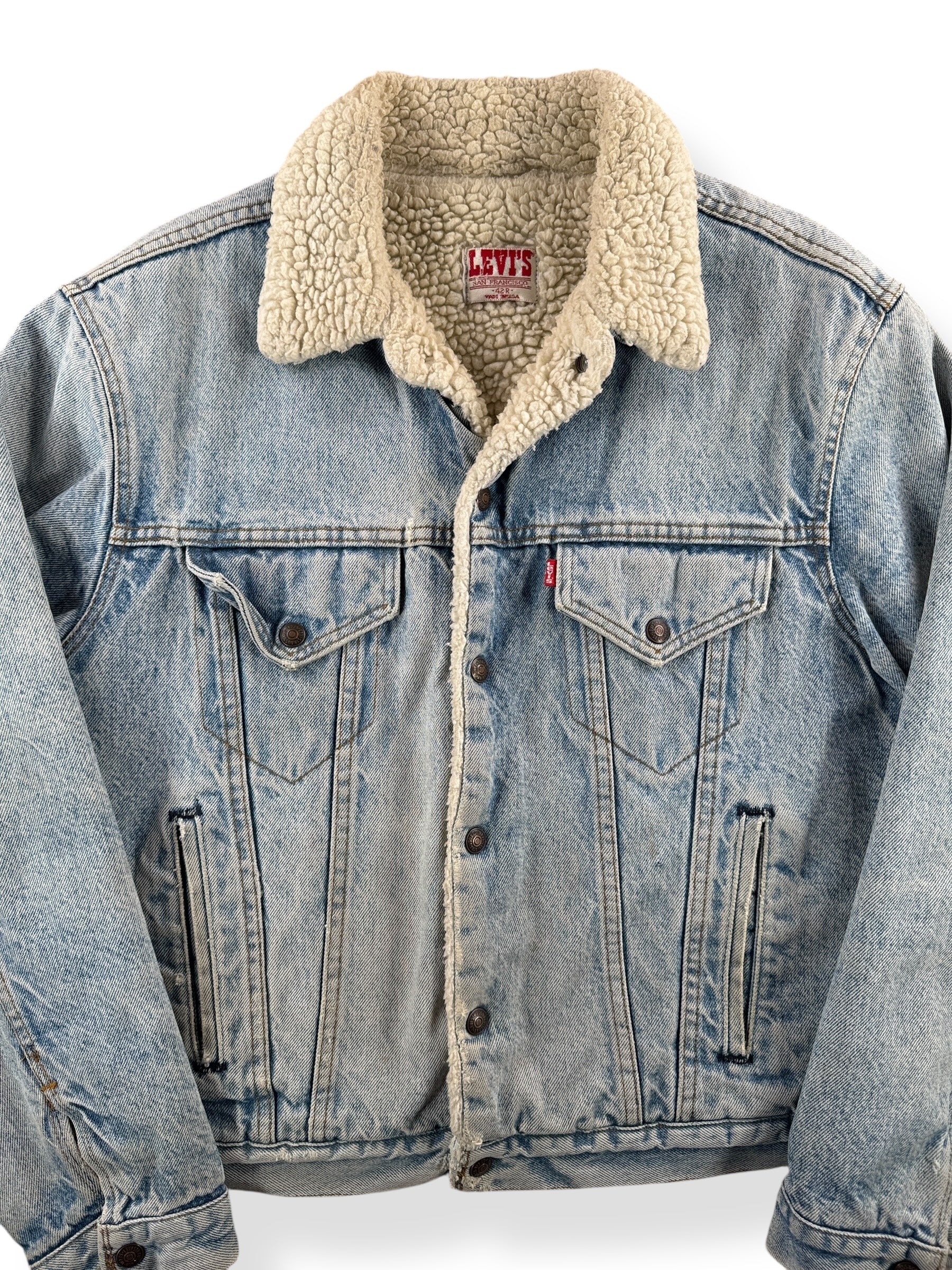 Front of Vintage Light Wash Levis Shearling Denim Trucker Jacket SZ 42