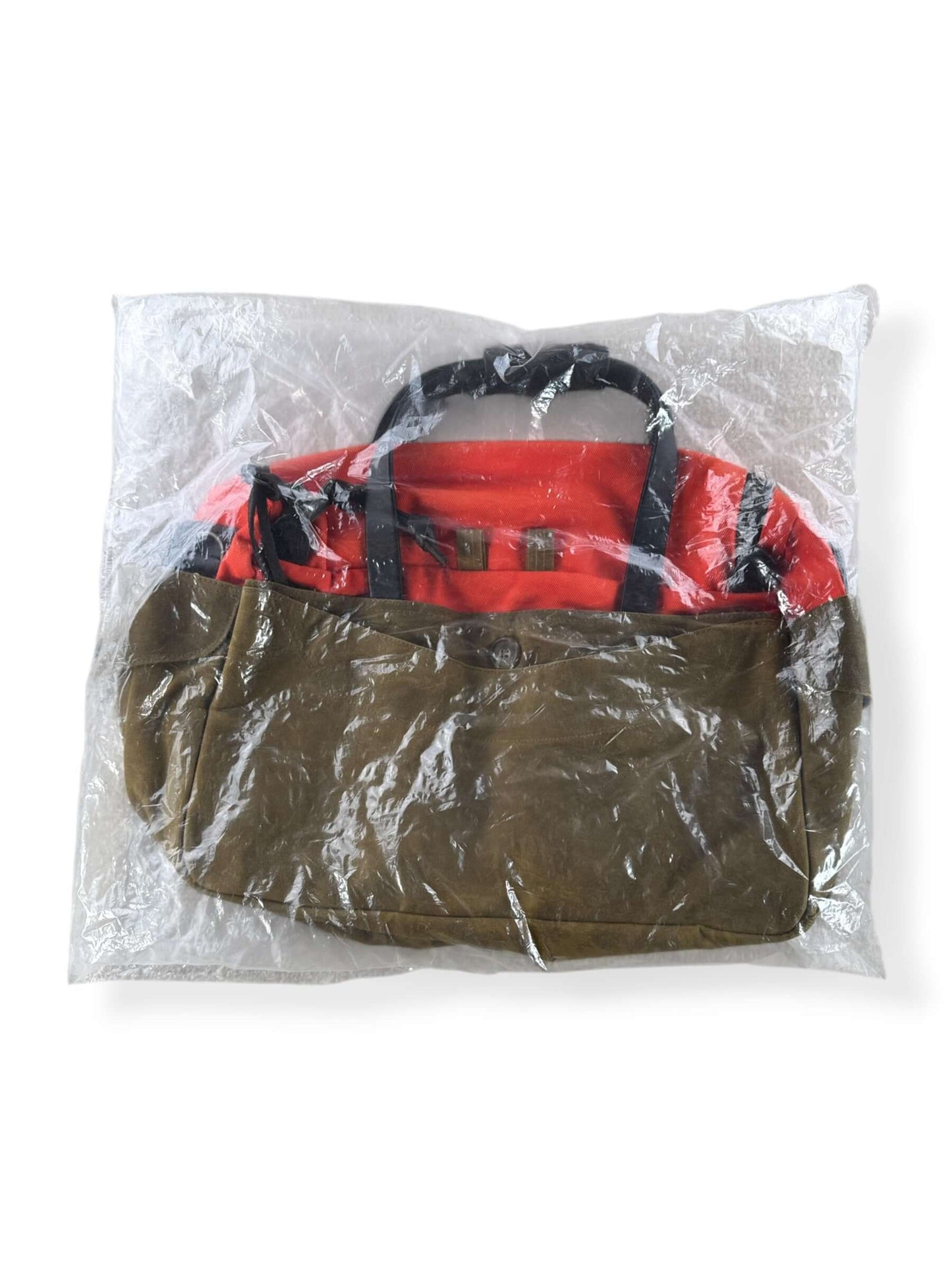 Sealed Plastic bag of Filson Heritage Sportsman Bag Orange Dark Tan NWOT