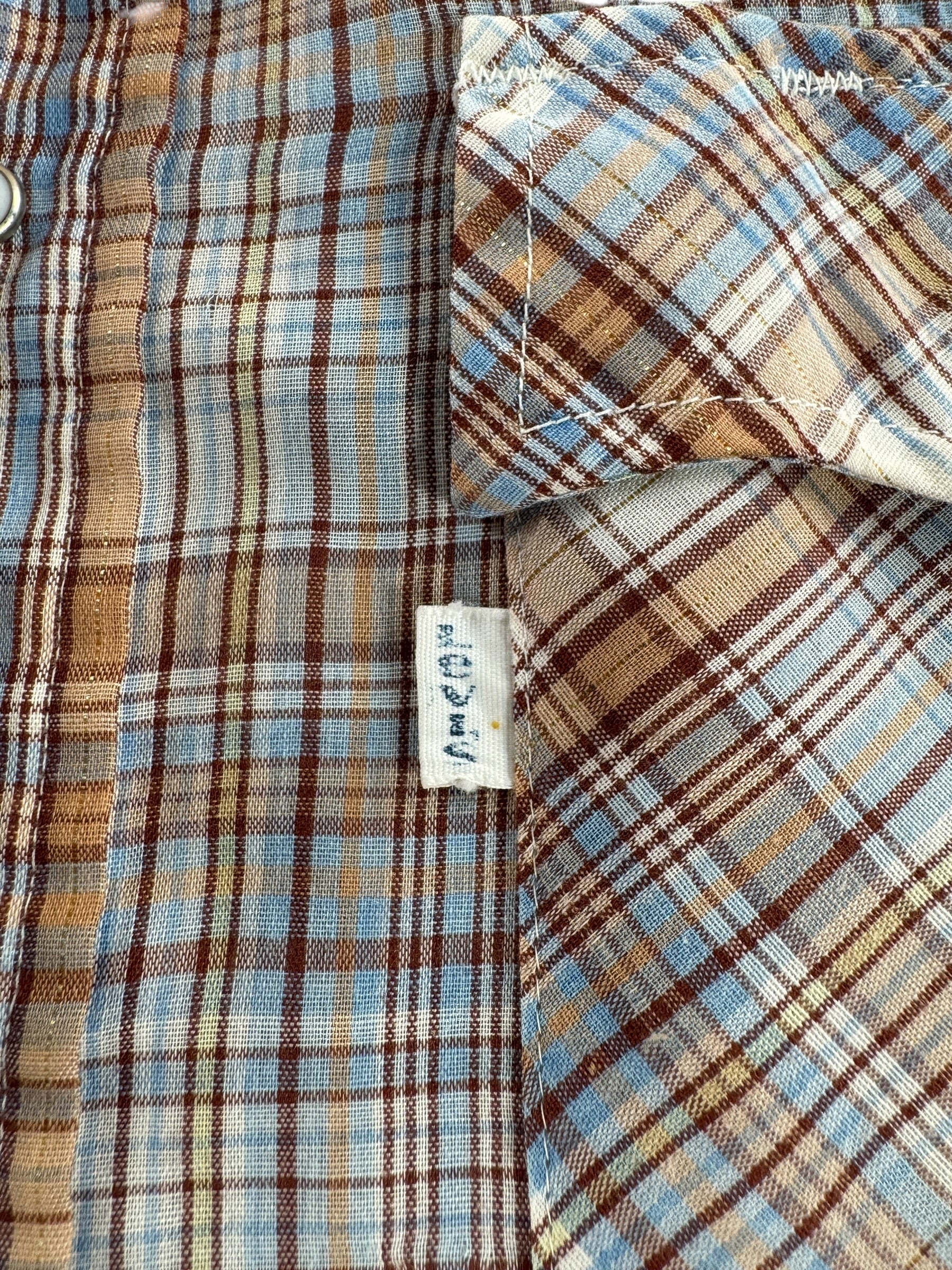 Label on Vintage Levi's Pearl Snap Shirt SZ XL