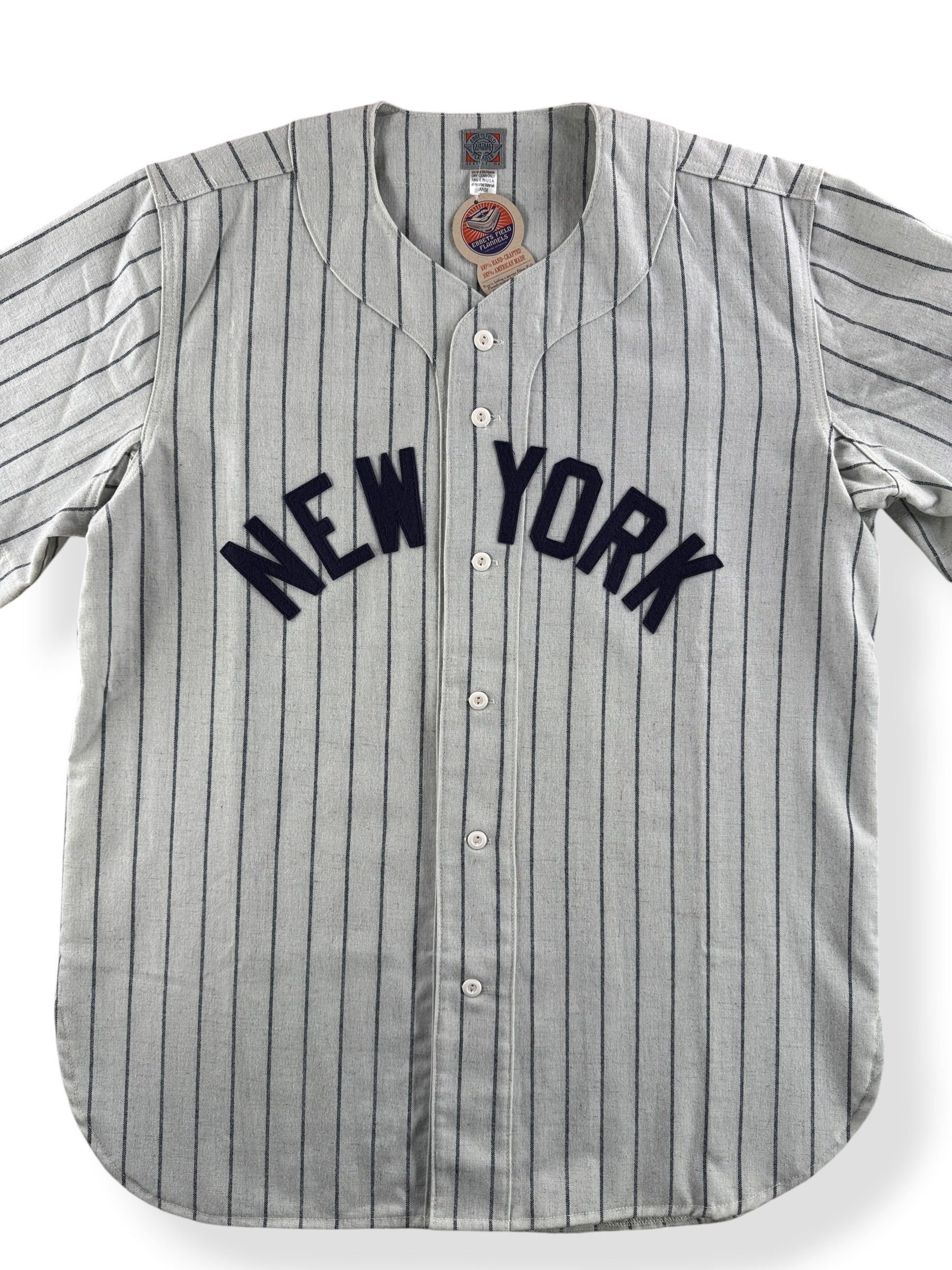 Close up of front on Deadstock EFF New York Baseball Jersey