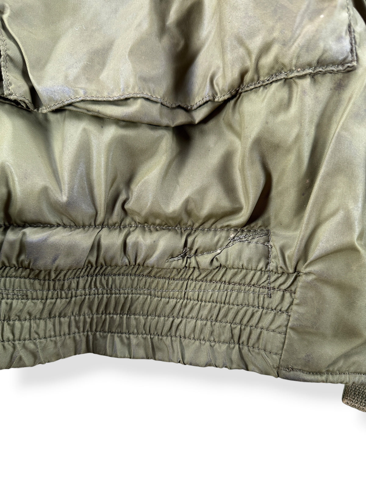 Repair near hem of Vintage Vietnam Winter Flyers Jacket w/ Patches SZ 46