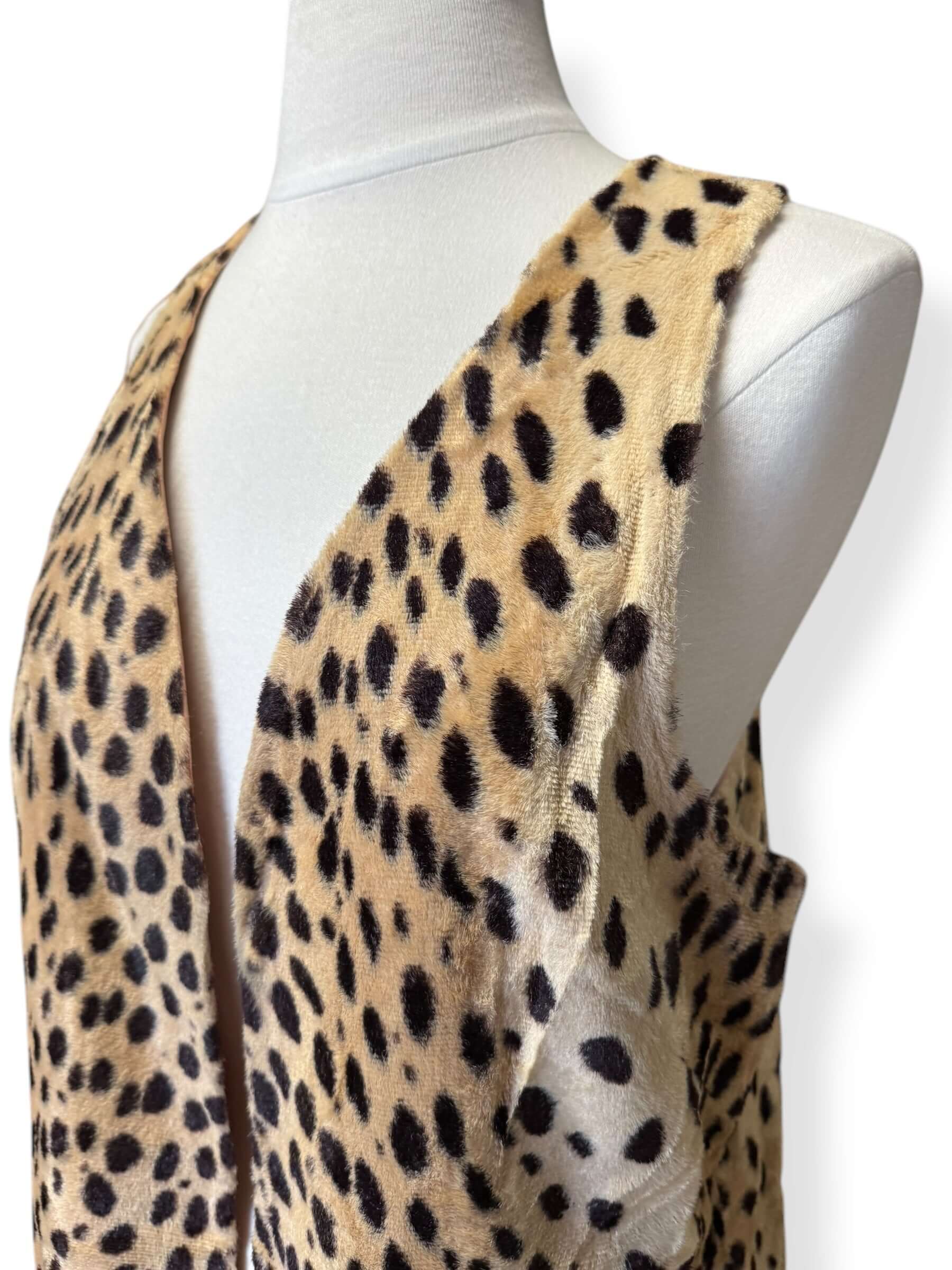 Side view of 1960s Faux Leopard Vest L