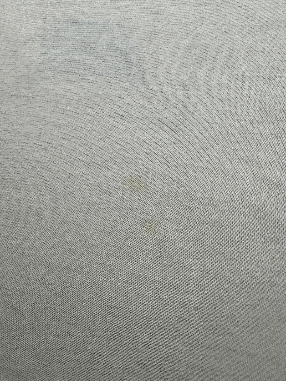Small stain on back of Vintage Conway and Loretta Tee SZ M