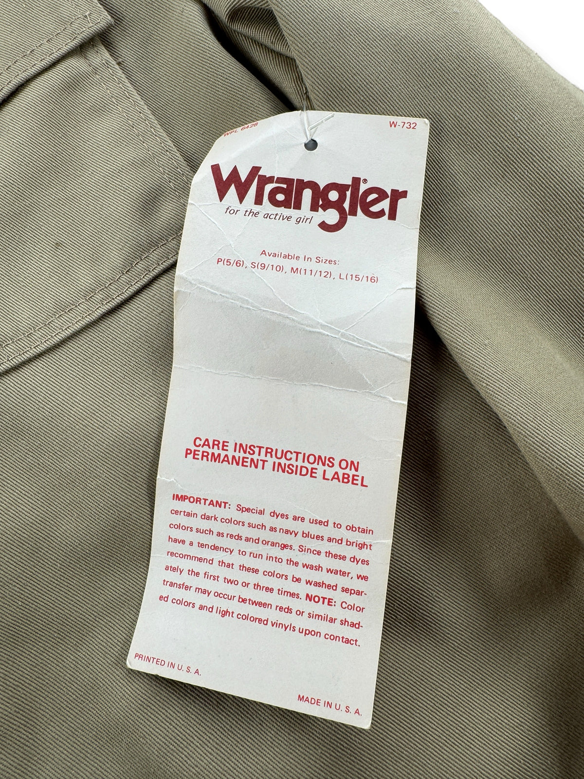 Back of original hang tag on Vintage NOS Wrangler Safari Jacket SZ M