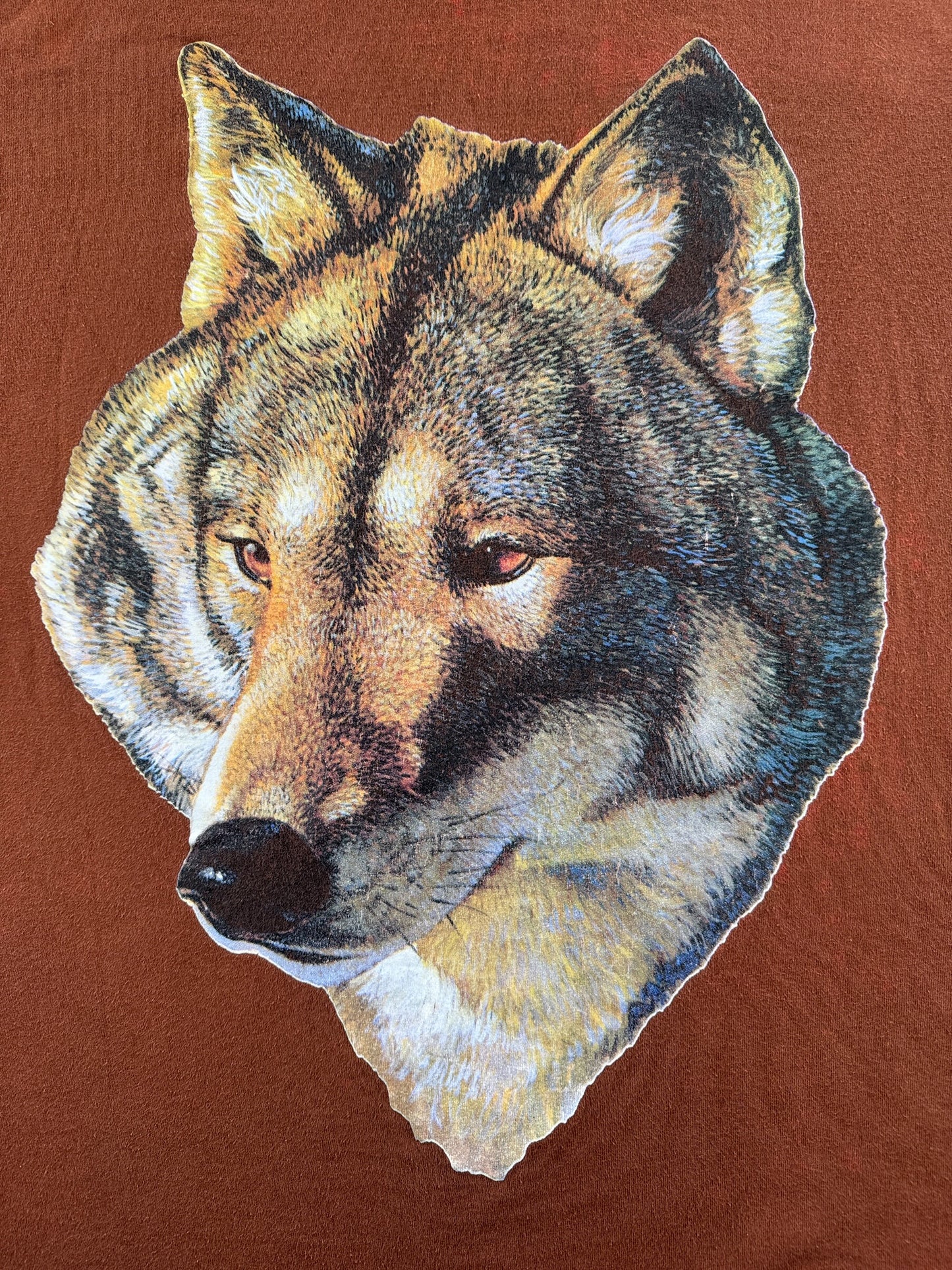 Close up of graphic on Vintage Brown Wolf Tee