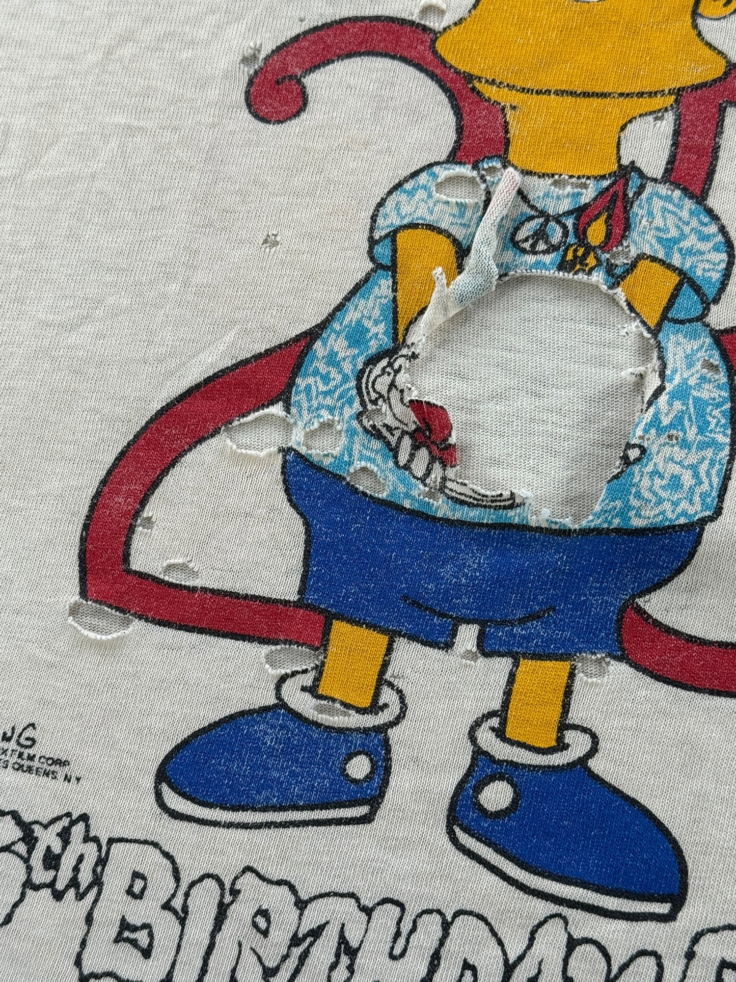 Damage on back of Vintage '90 Spring Tour Grateful Dead Bart Simpson Thrasher Tee SZ XL