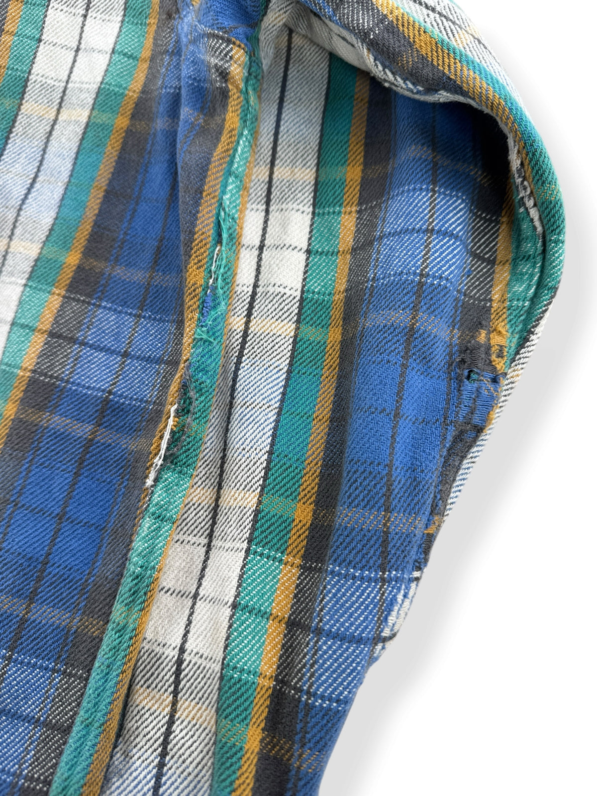 Ware on back of sleeve of Vintage 80s Thrashed Cotton Flannel SZ XL