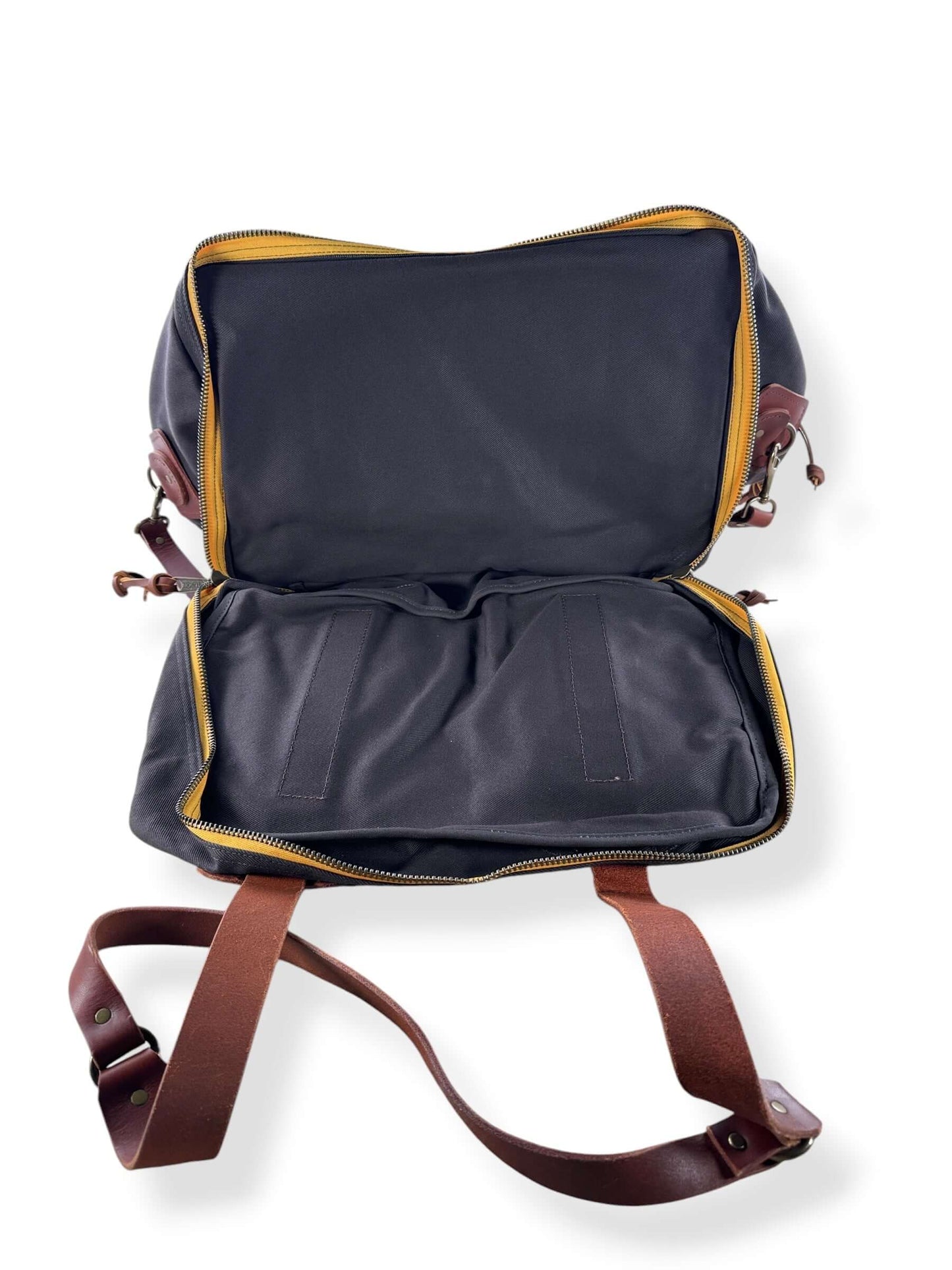Open bottom compartment on Filson x Chris Stapleton Traveller Outfitter Bag NWOT