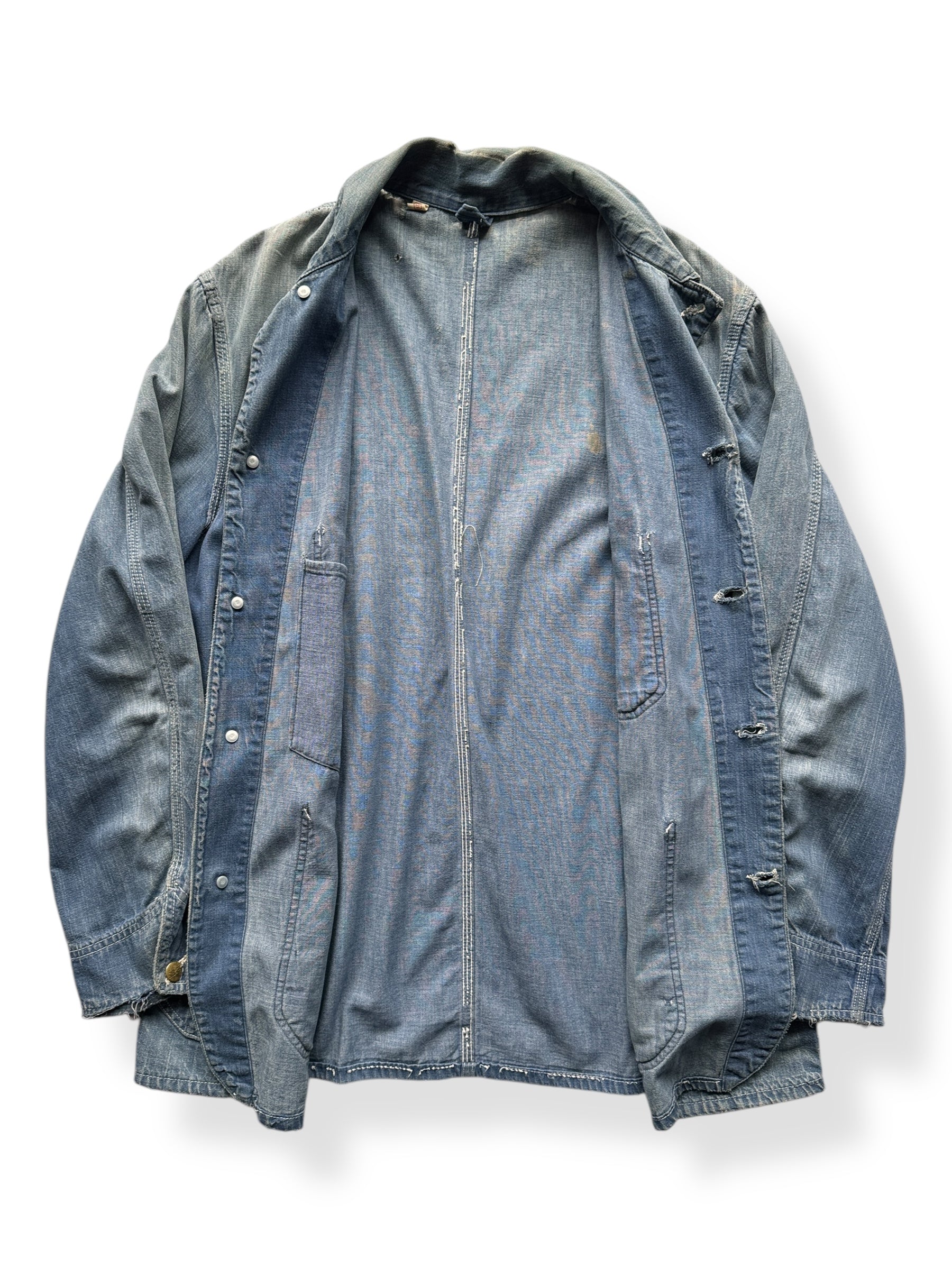 Inside of Vintage Sears Distressed Unlined Denim Chore Jacket SZ 42 AS IS