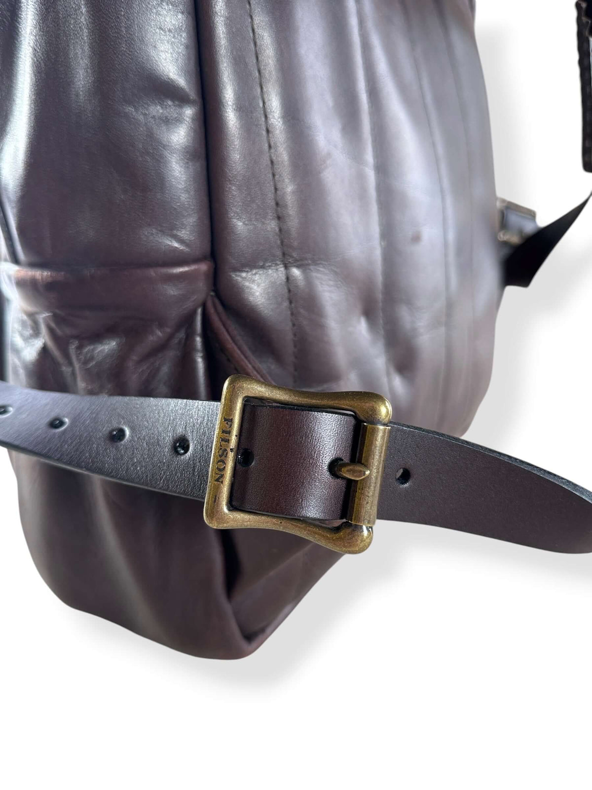 Buckles on Filson Weatherproof Sierra Brown Leather Journeyman Backpack
