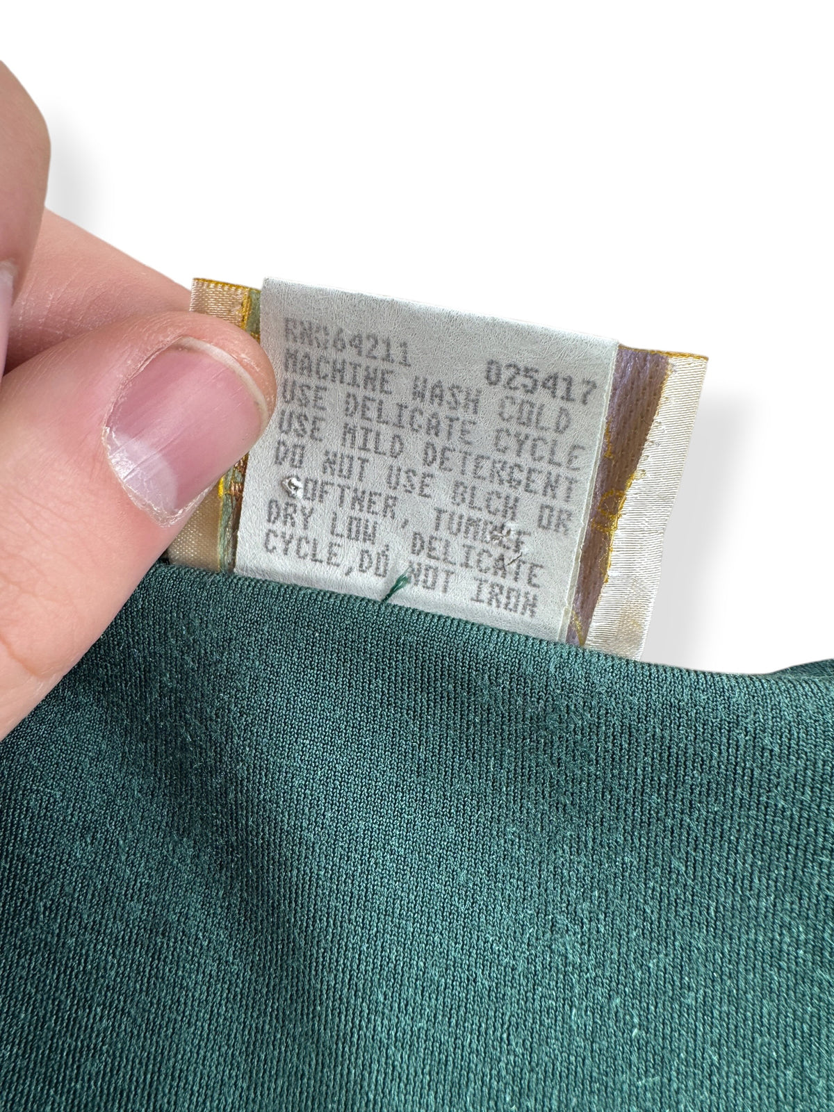 Back of info tag n Vintage Green Velvet Top SZ M