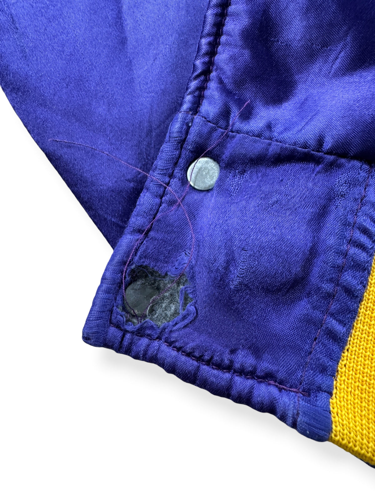 Ware near bottom hem on Vintage Skyline UW Club Jacket SZ M