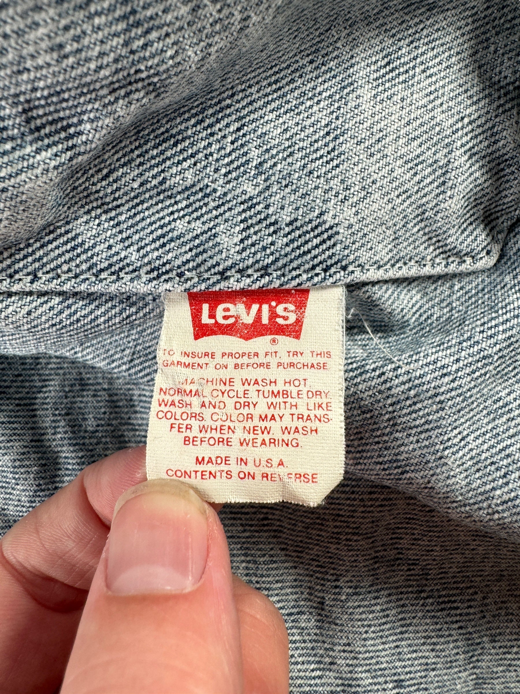 Tag on Vintage Levi's Acid Wash Type 3 Jacket SZ L