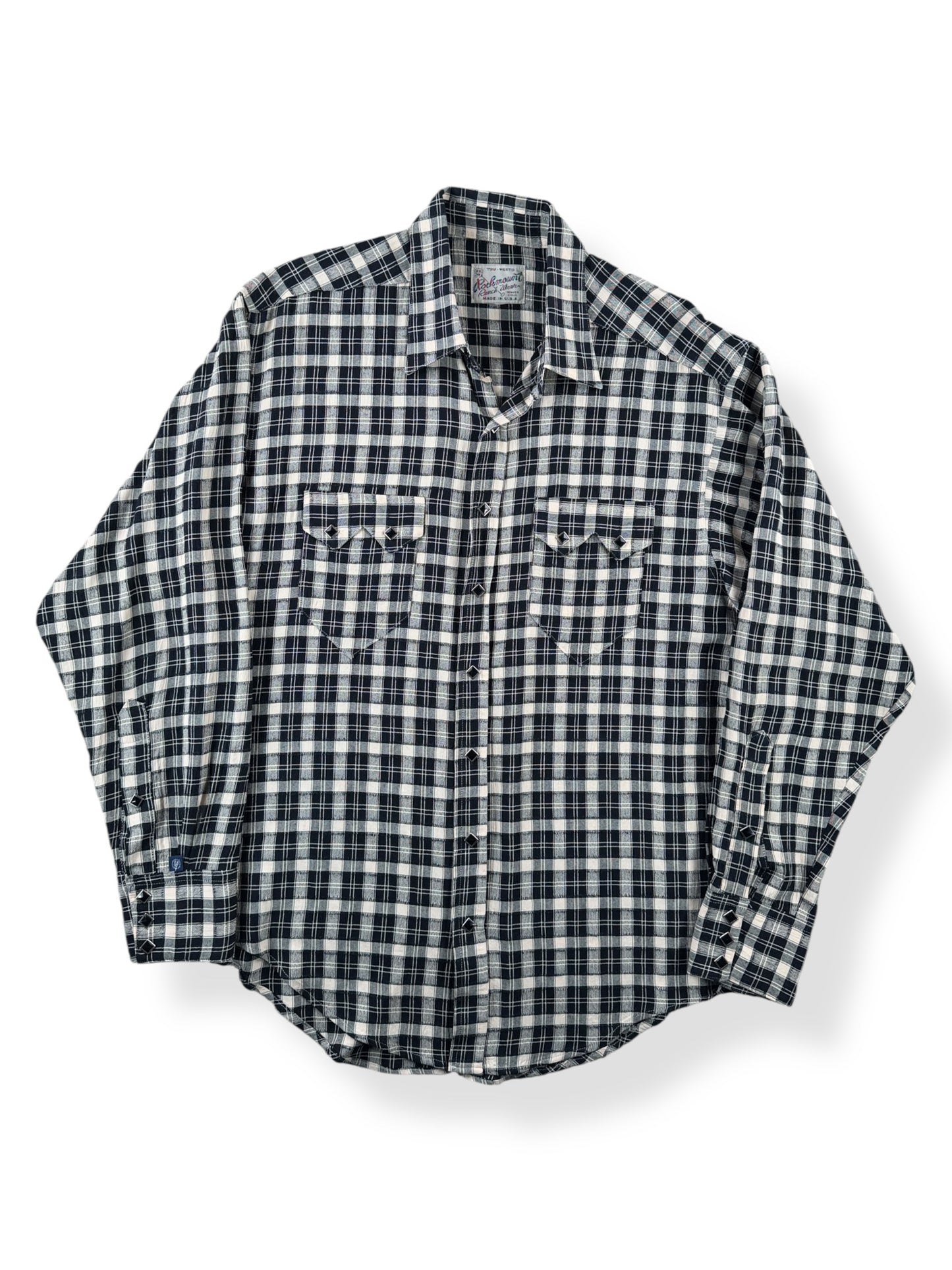 Front of Vintage Rockmount Black & White Sawtooth Pearl Snap SZ L