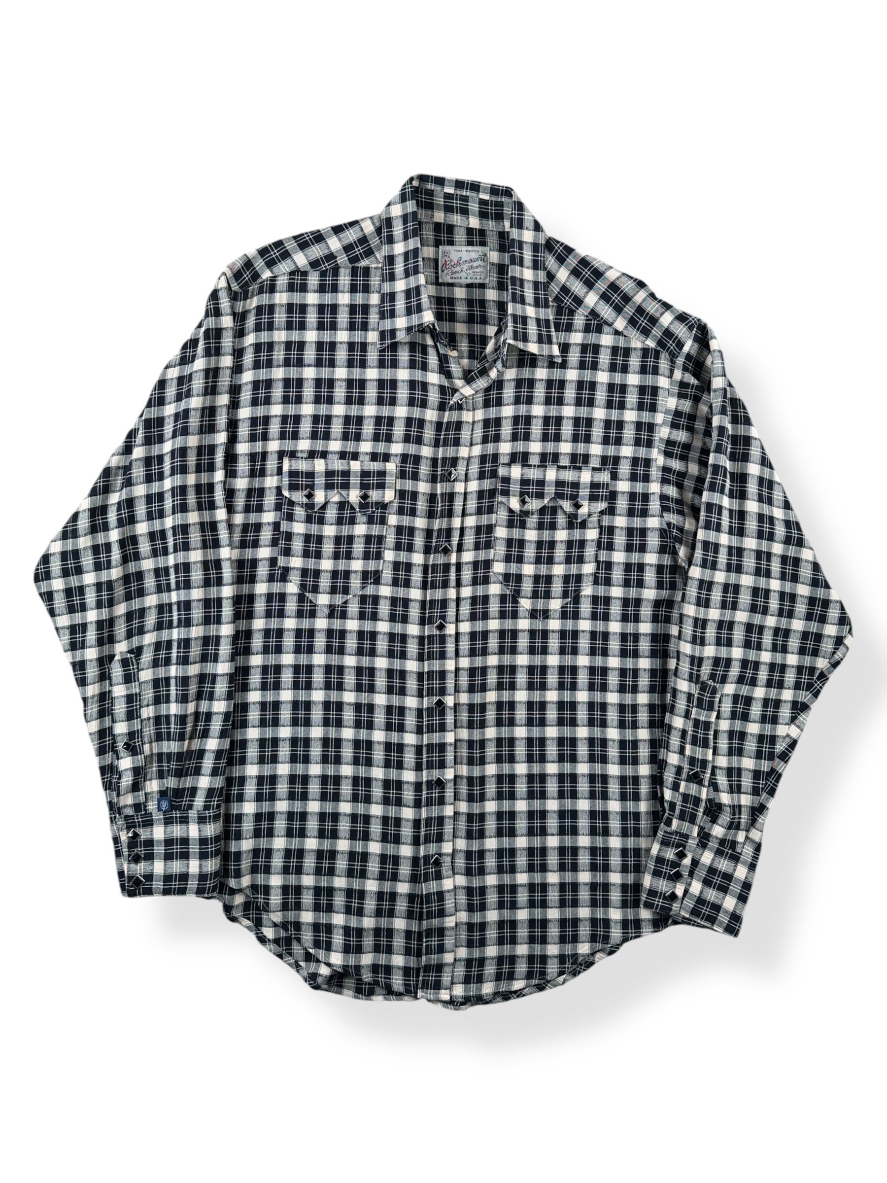 Front of Vintage Rockmount Black & White Sawtooth Pearl Snap SZ L