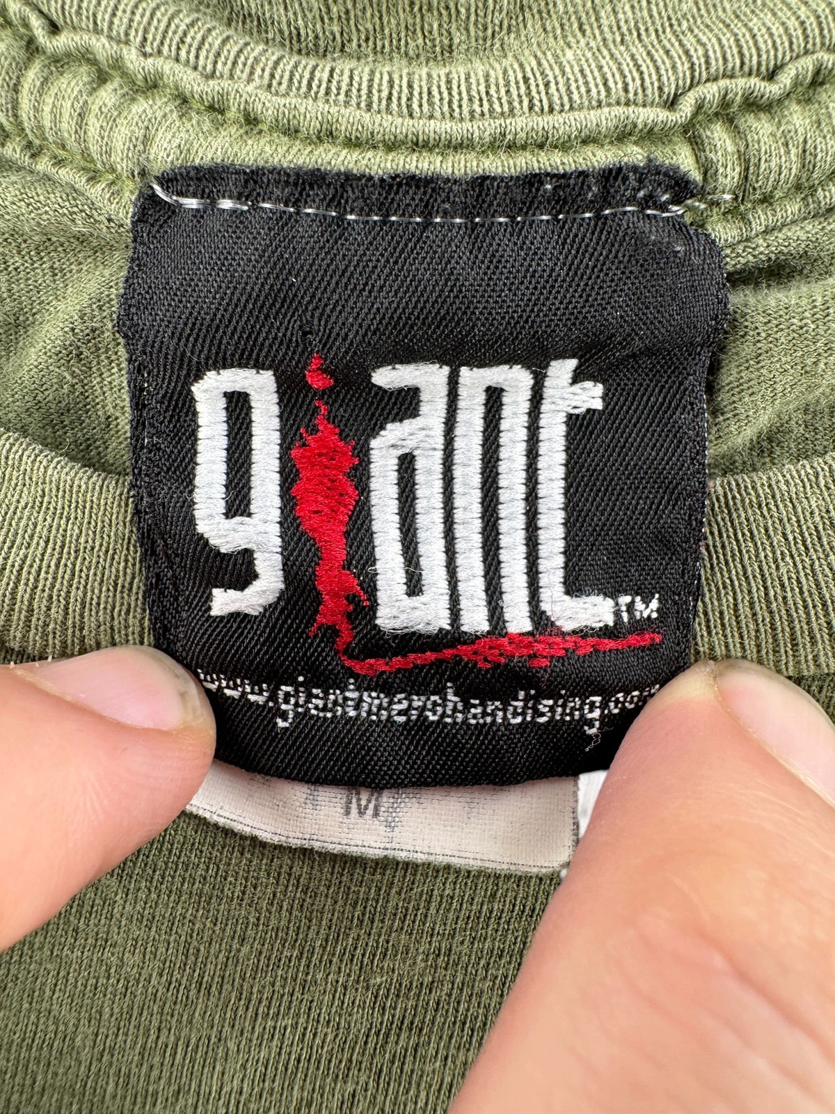 tag of Vintage Nine Inch Nails Giant Tag Tee SZ M