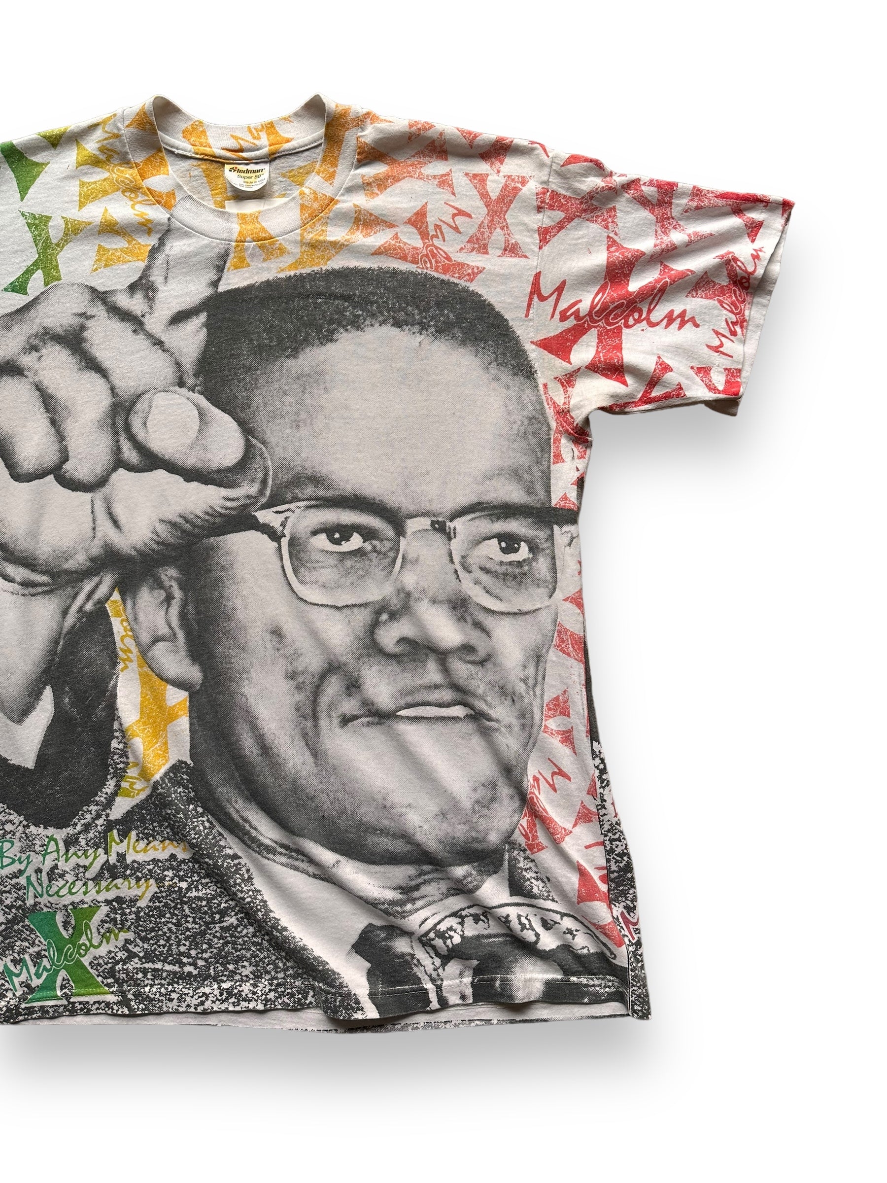 Front Left View of Vintage Malcolm X All Over Print Tee SZ L | Vintage Malcolm X T-Shirts Seattle | Barn Owl Vintage Clothing Seattle