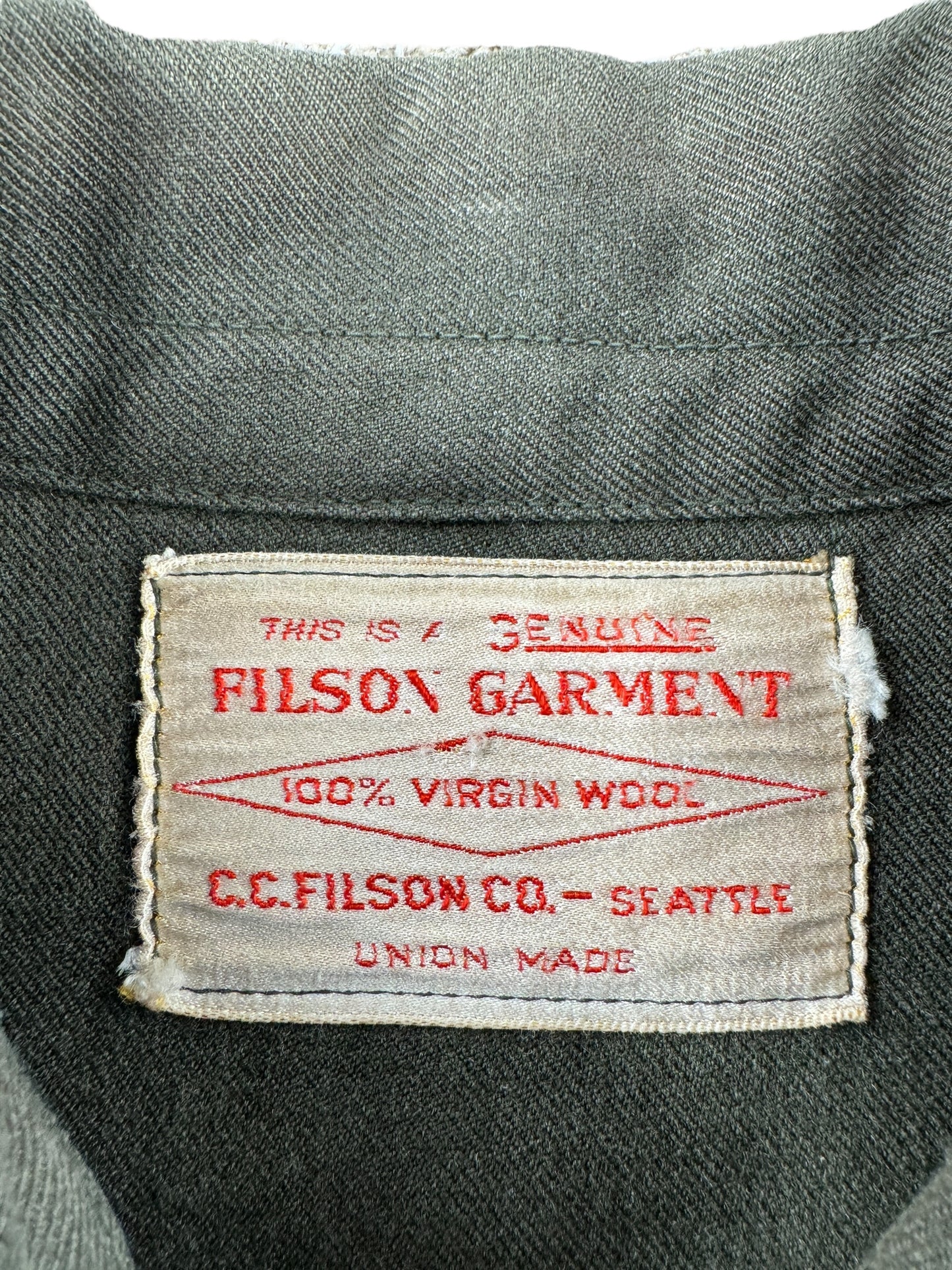 Tag on Vintage Union Made Filson Forestry Cloth Jacket SZ M