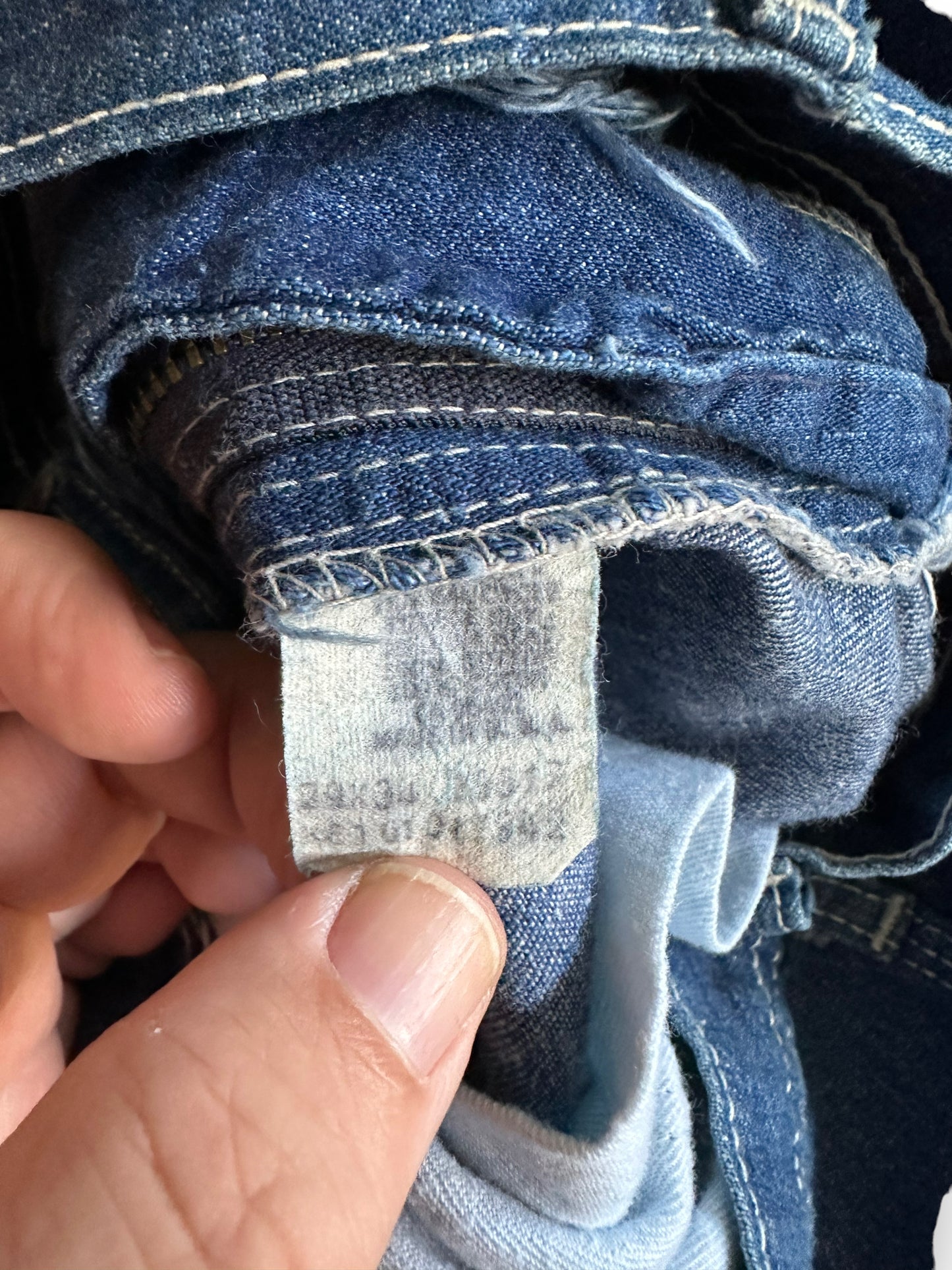 Tag View of Vintage Lee Carpenter Jeans W27 | Vintage Denim Workwear Seattle | Barn Owl Vintage Clothing