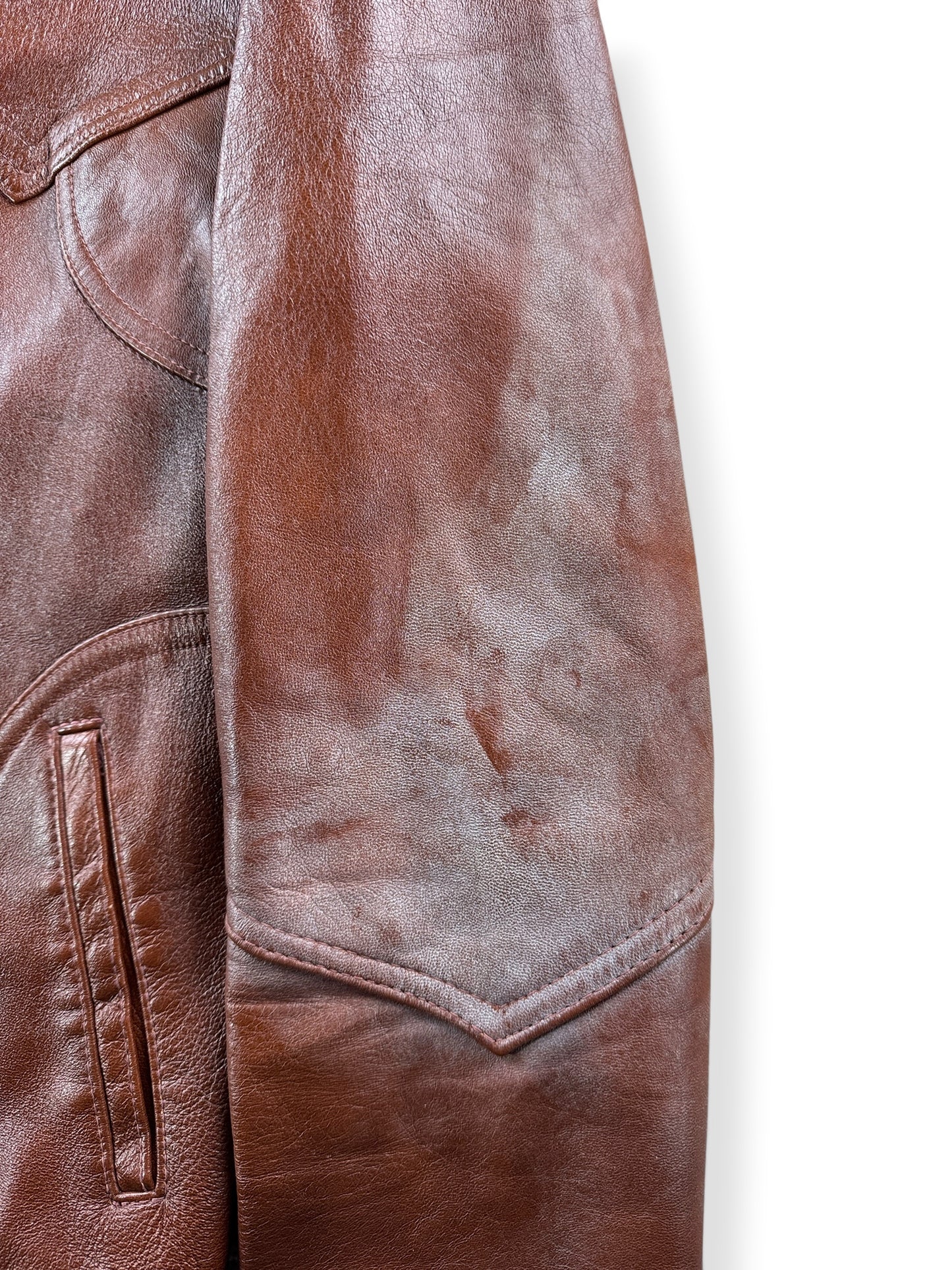 Minor discoloration on left arm of Vintage 70s Brown Leather Jacket SZ 40