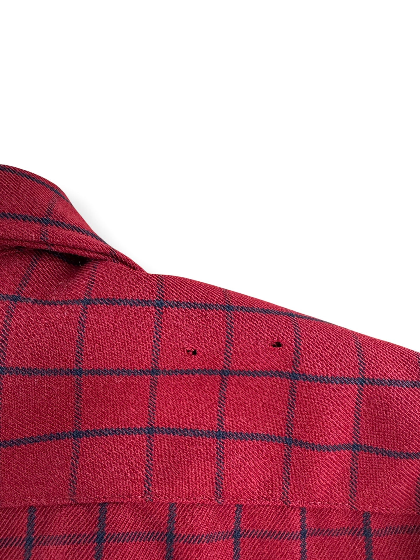 Small pinholes on back right shoulder of Filson Red Guide Shirt SZ L