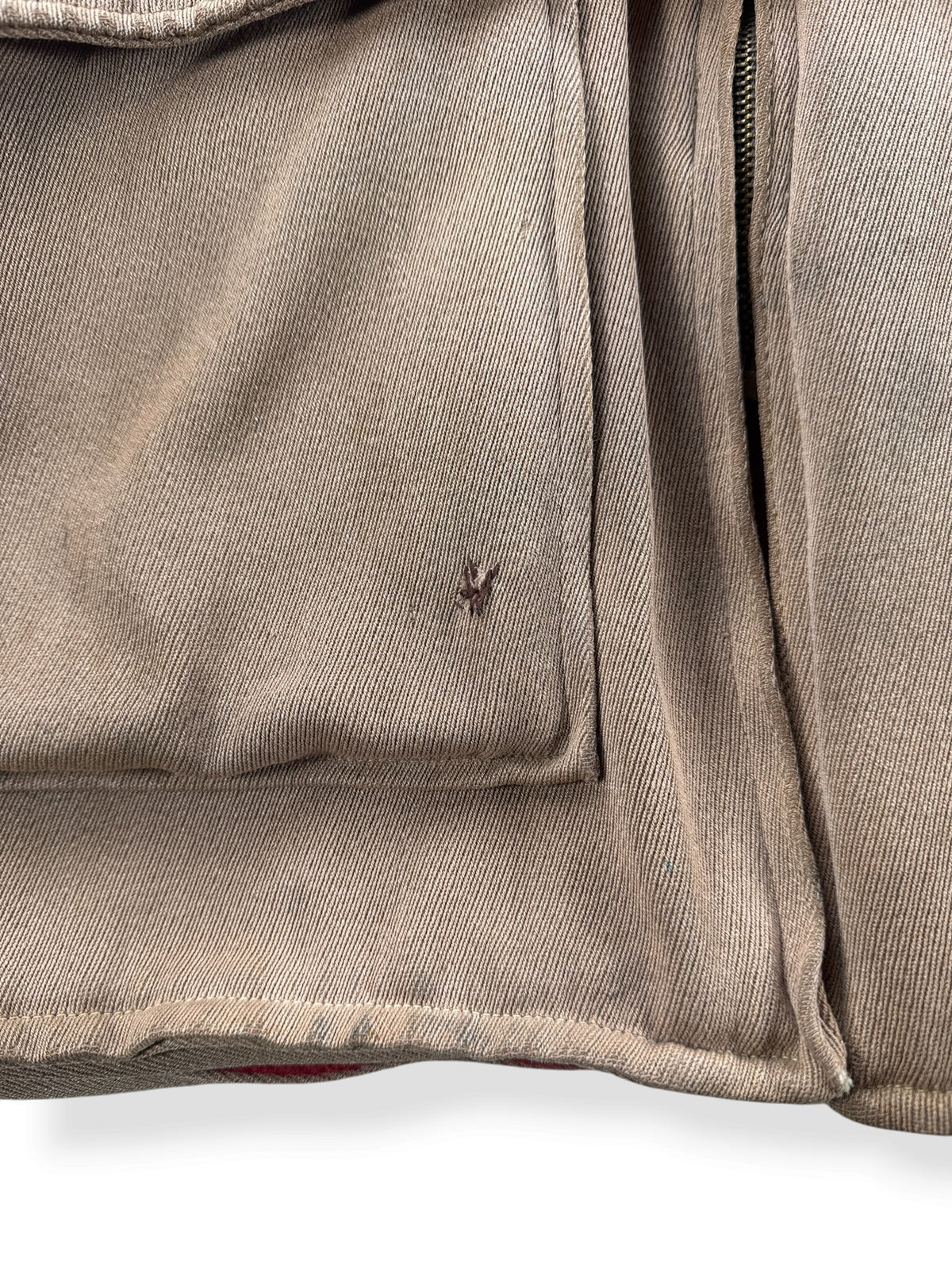 Small repair on front pocket of Vintage 40s JC Penny Sport Clad Calvary Twill Jacket SZ L