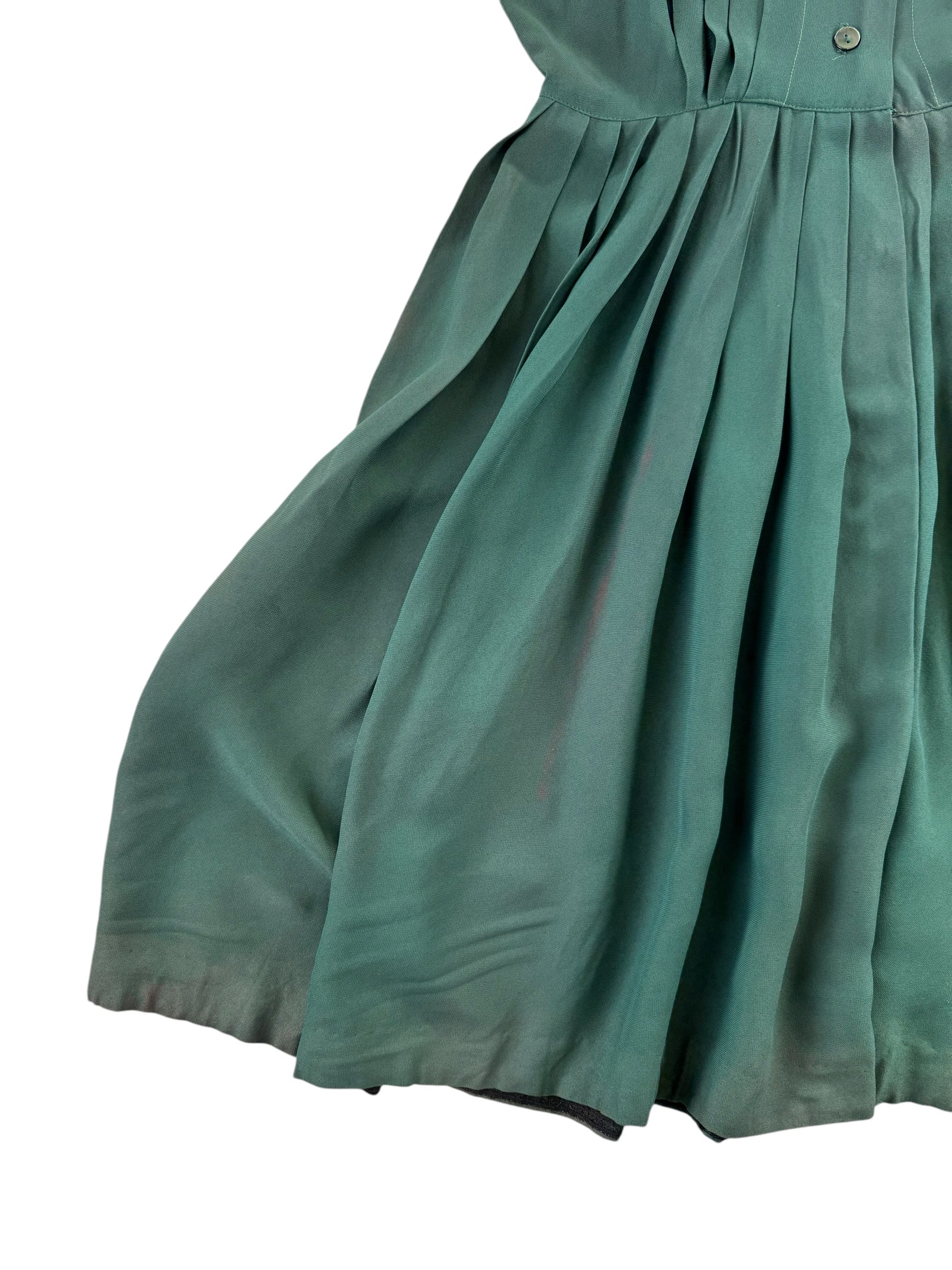 Front right side of skirt of 1940s Green Rayon Pleated Dress M